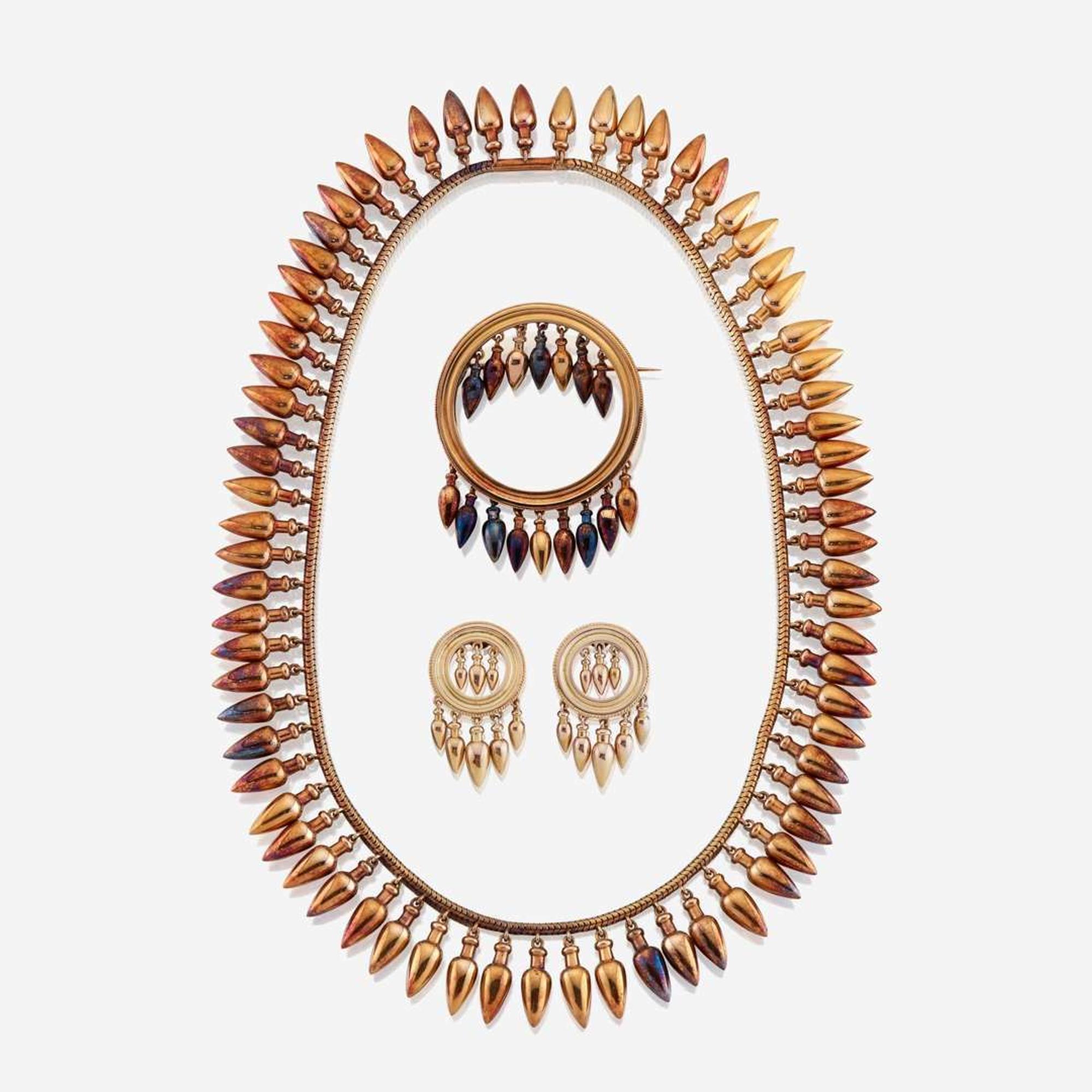A fourteen and eighteen karat gold suite
