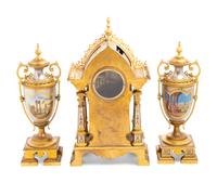 A French Gilt Bronze and Painted Porcelain Clock Garniture