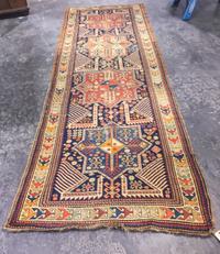 A Northwest Persian Wool Runner 10 feet x 3 feet 10 inches. — FIRST QUARTER 20TH CENTURY