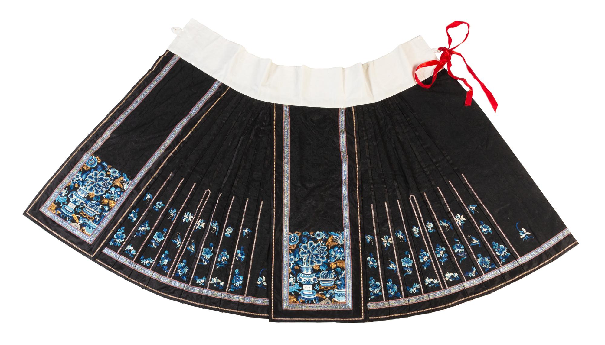 A Black Ground Embroidered Silk Apron Skirt Length 38 inches. — EARLY 20TH CENTURY