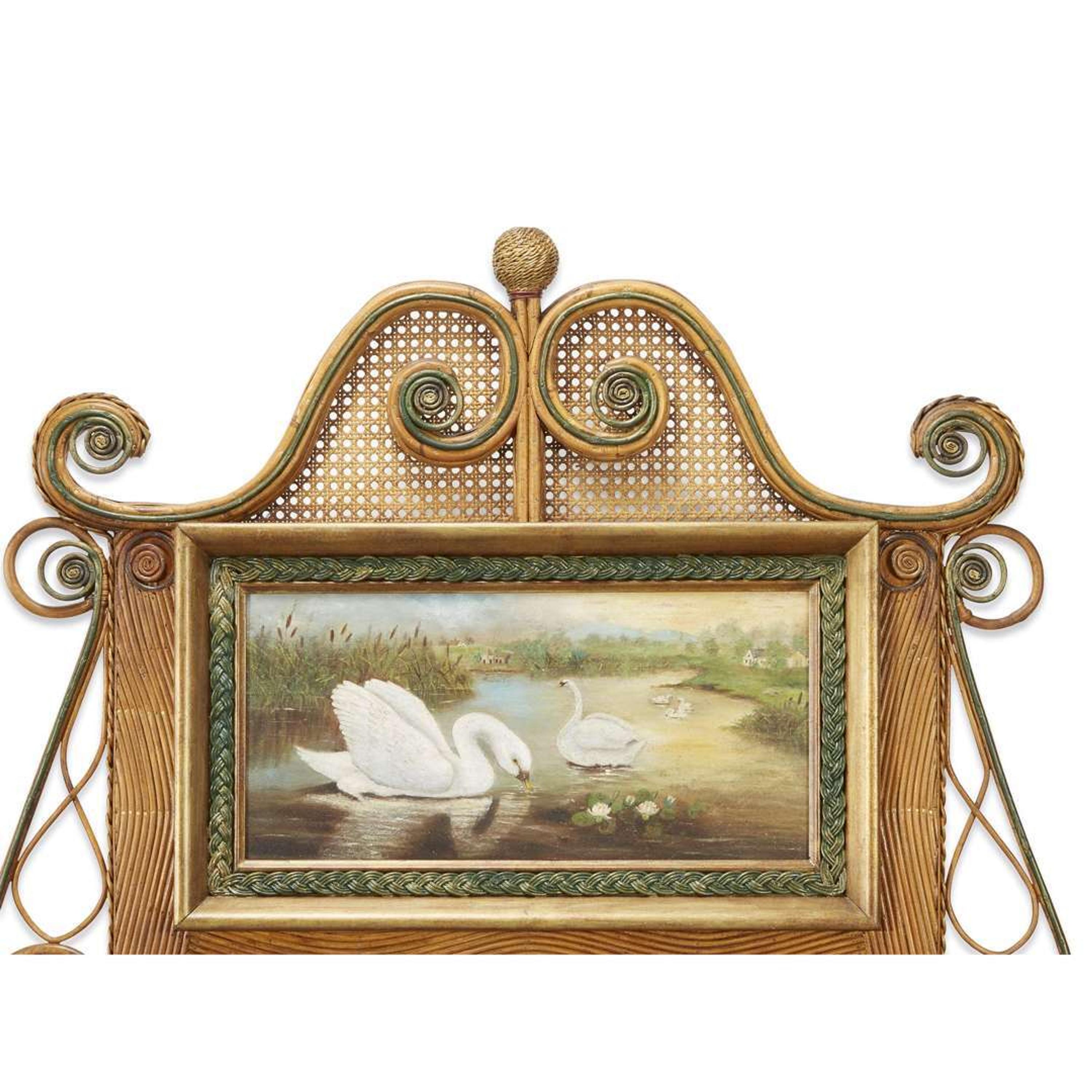 A large polychrome painted rattan and cane mirror with swans american, circa 1900