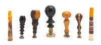 A Collection of Five Turned Wood Seals, Height of tallest 4 3/8 inches.