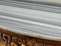A Pair of Italian Neoclassical Style White Painted and Parcel Gilt Marble-Top Console Tables