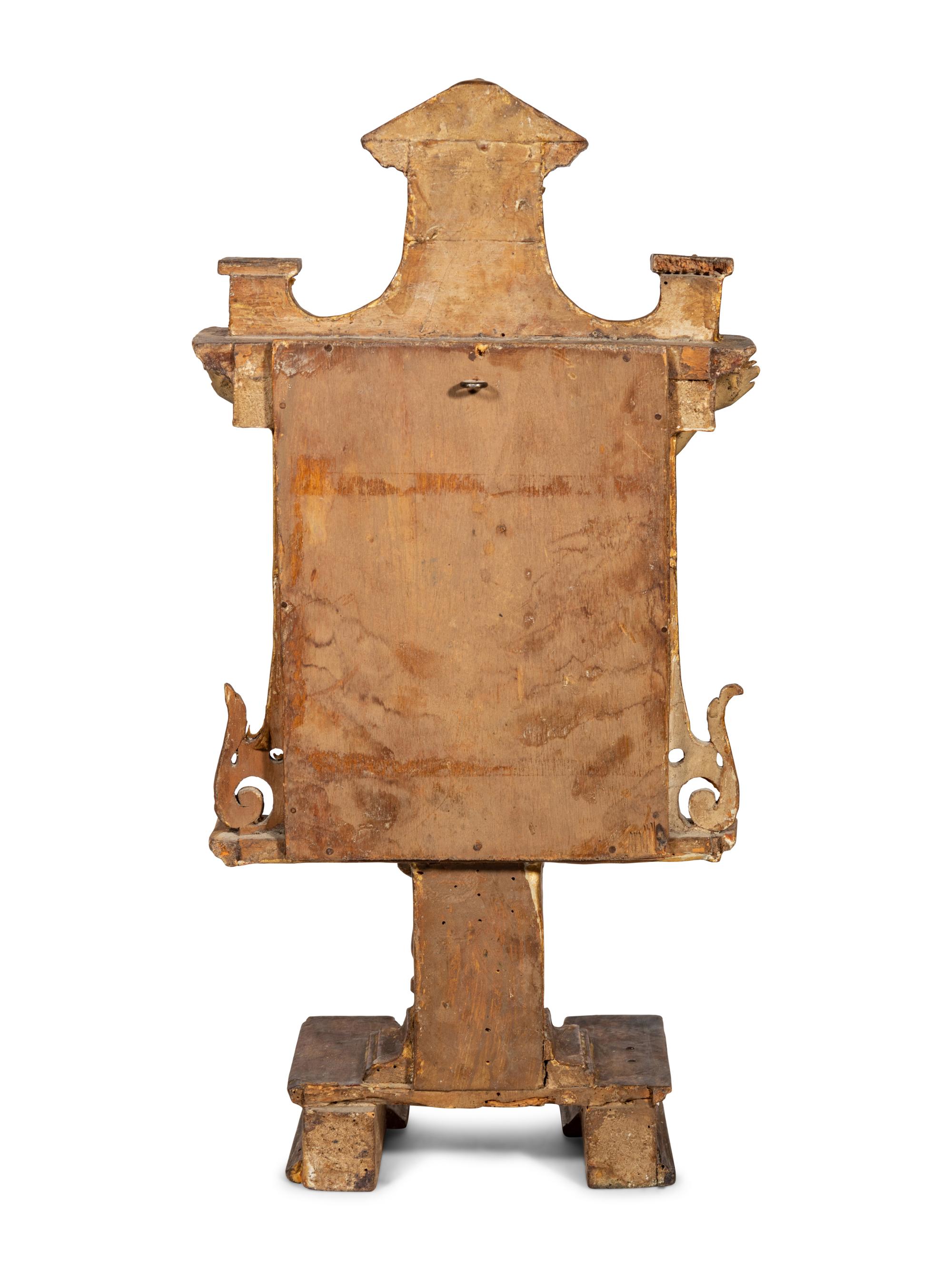 A Continental Carved, Polychromed, Parcel Gilt and Mirrored Crucifix