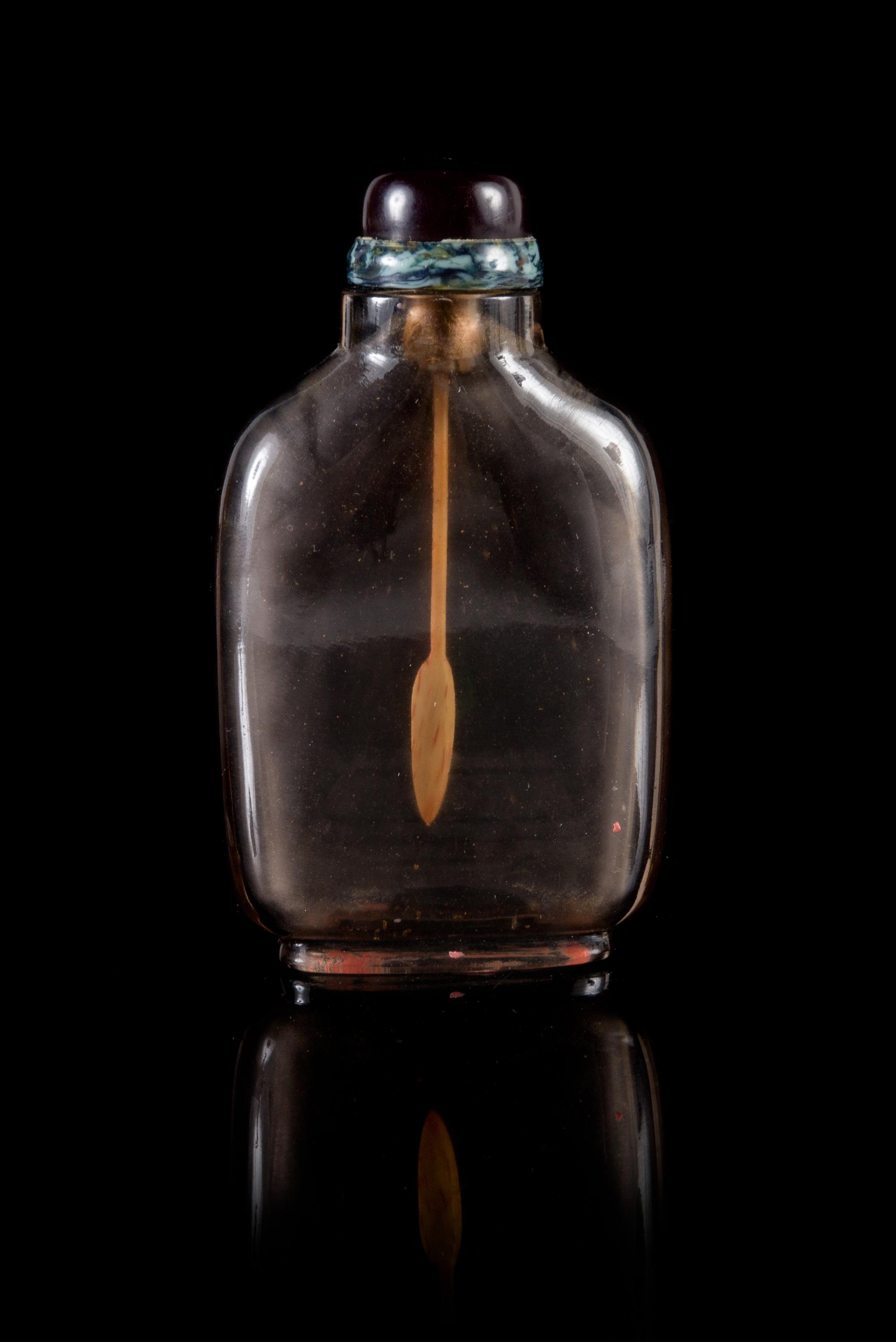 A Smokey Crystal Snuff Bottle Height 3 1/4 inches.