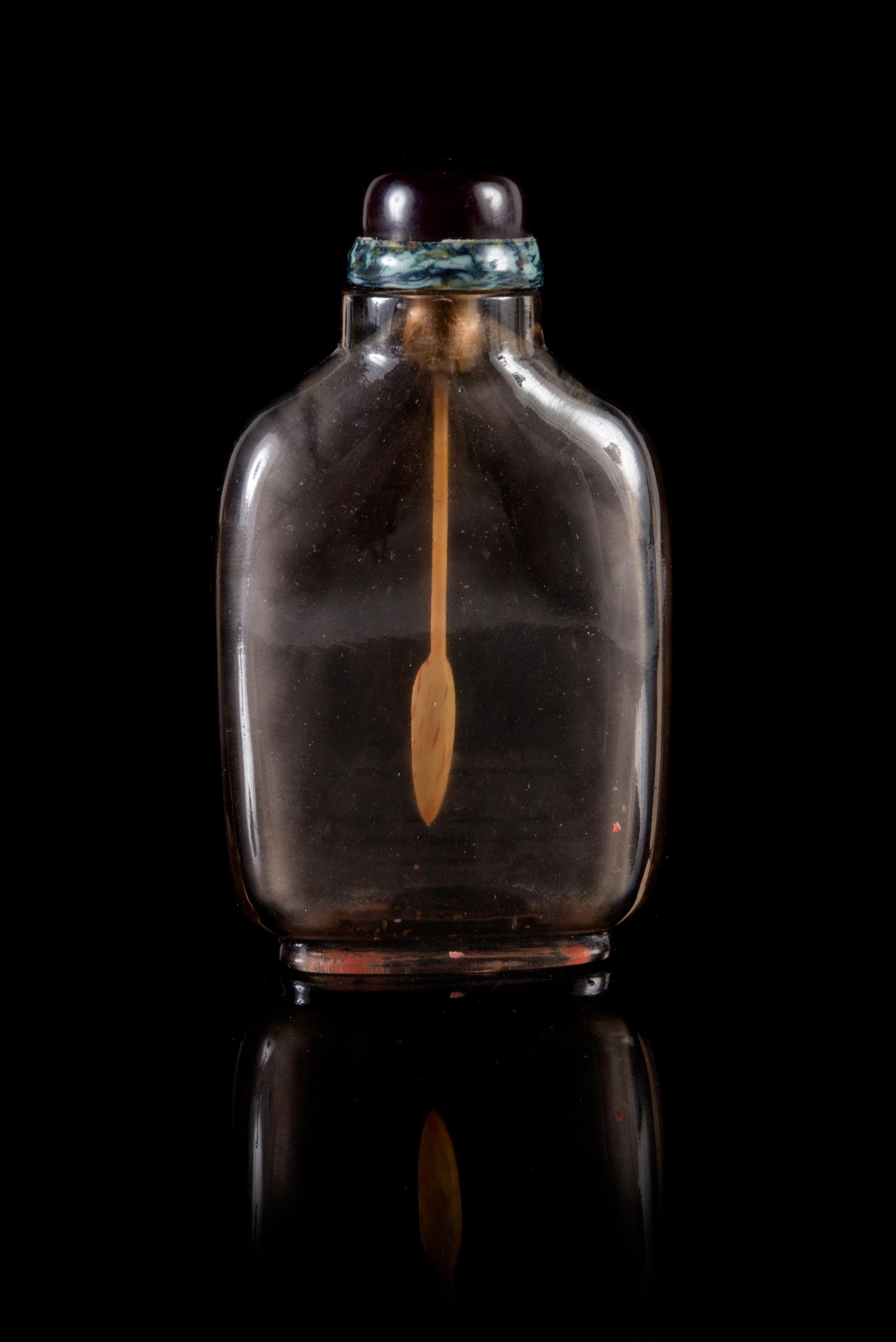 A Smokey Crystal Snuff Bottle Height 3 1/4 inches.