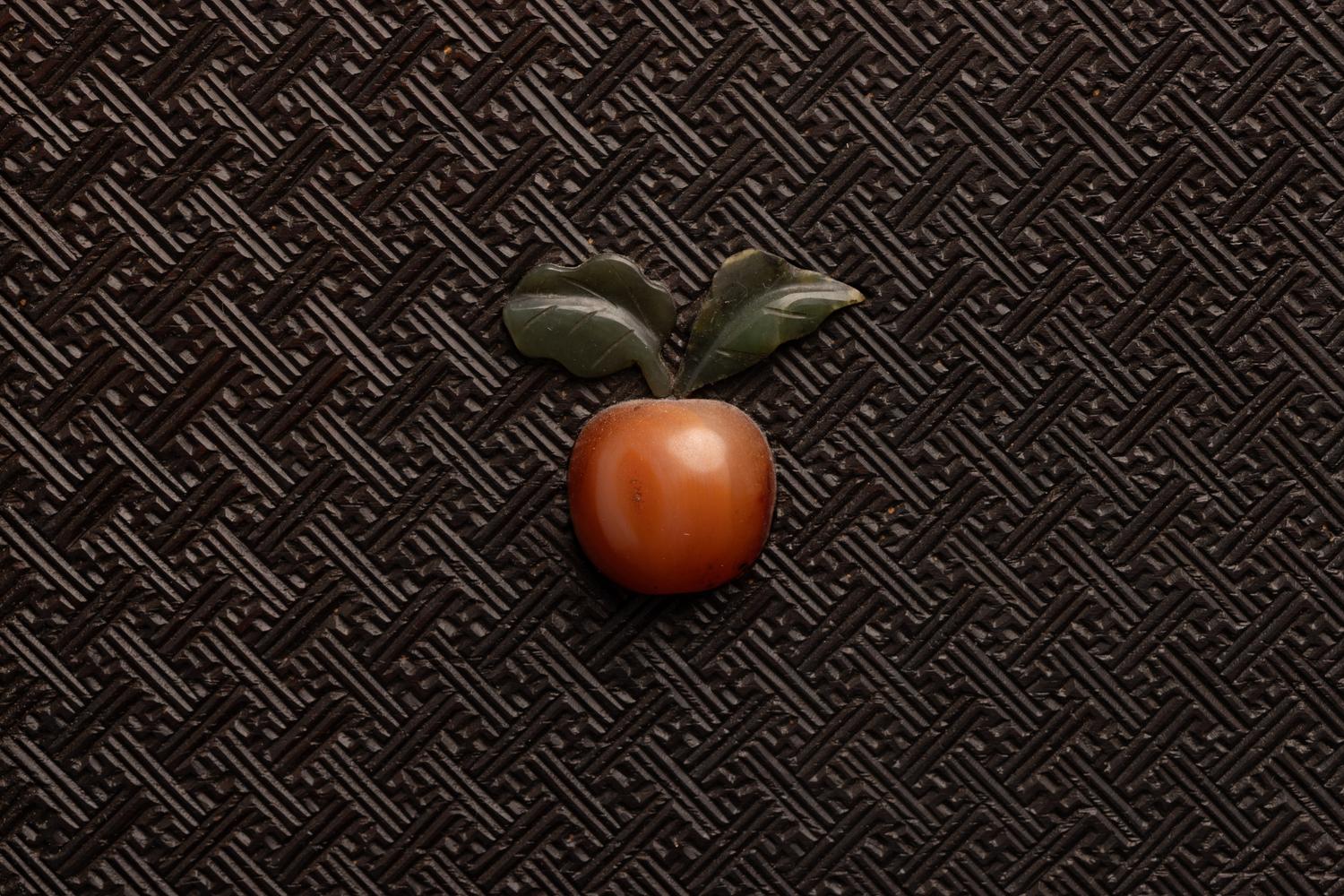A Chinese Jade and Hardstone Inset Hardwood Wall Panel