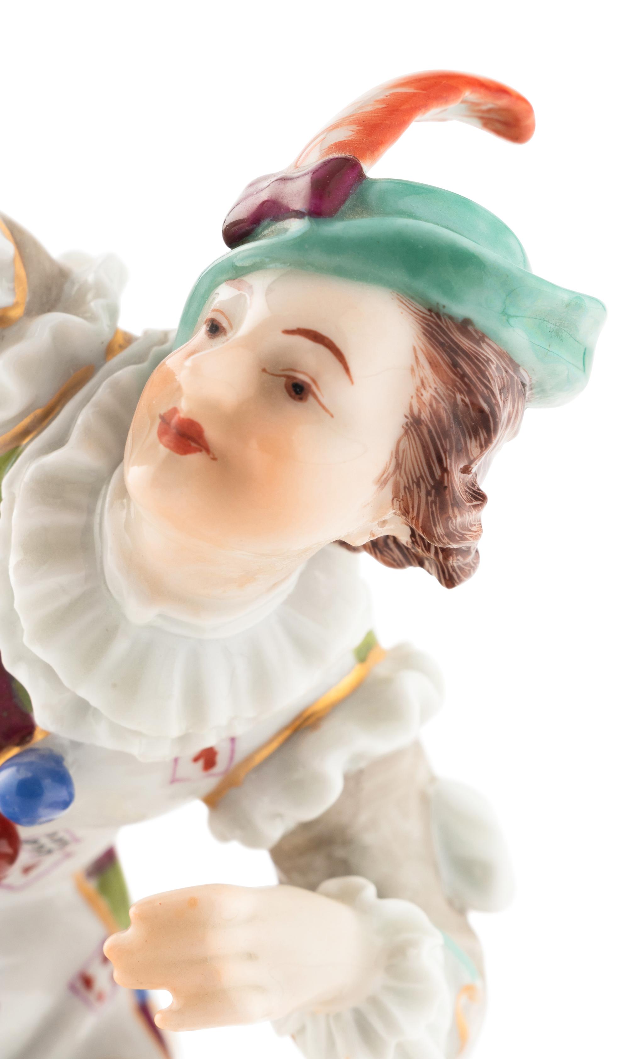 A Chelsea Porcelain Harlequin Figure