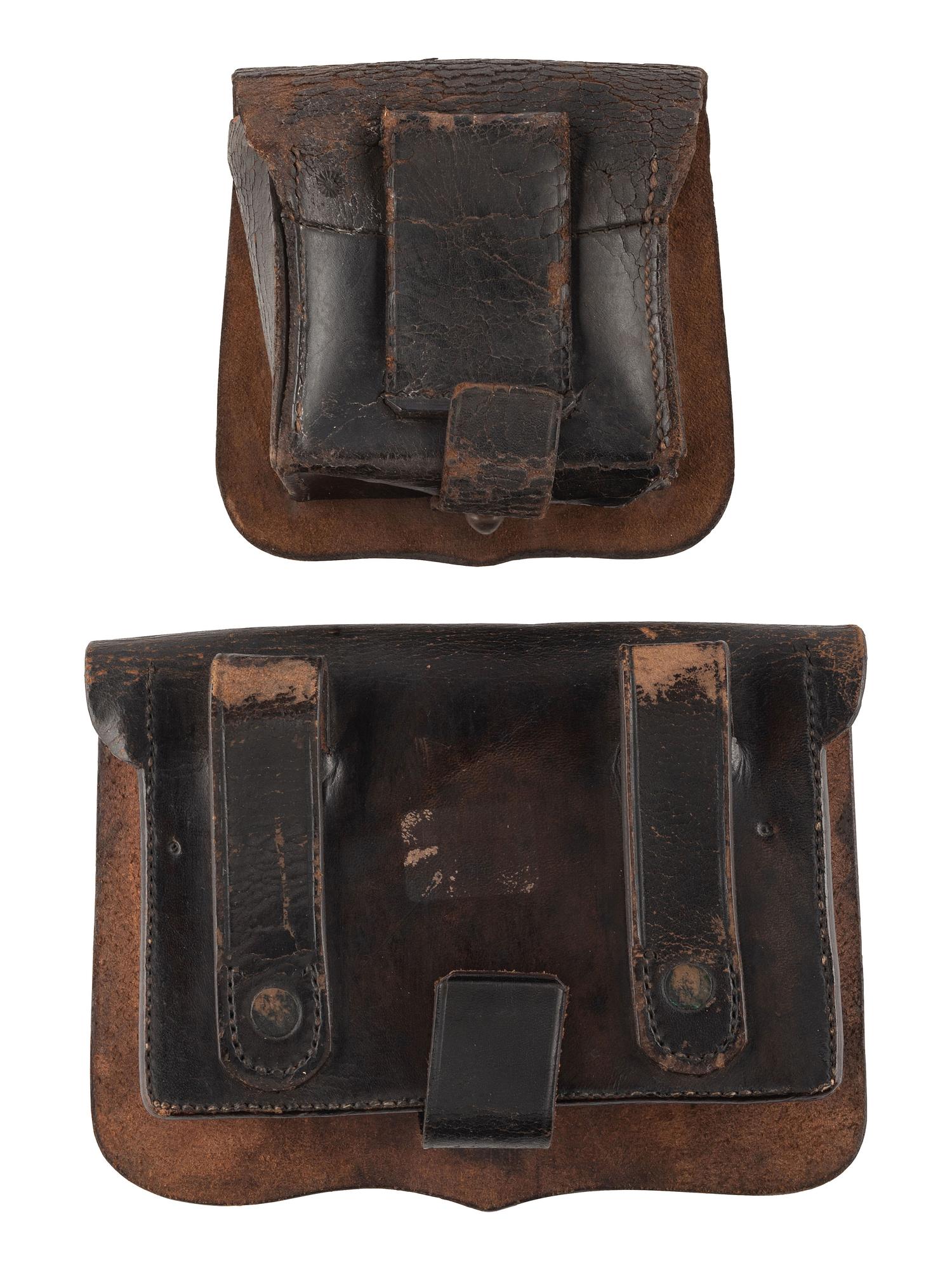 [CIVIL WAR]. A group of 7 items used by a soldier in the field, incl. US issued military cup, Navy fuse pouch, pistol cartridge box, bone handled fork, mirror with patriotic motif, and two dug spurs from the battlefield.