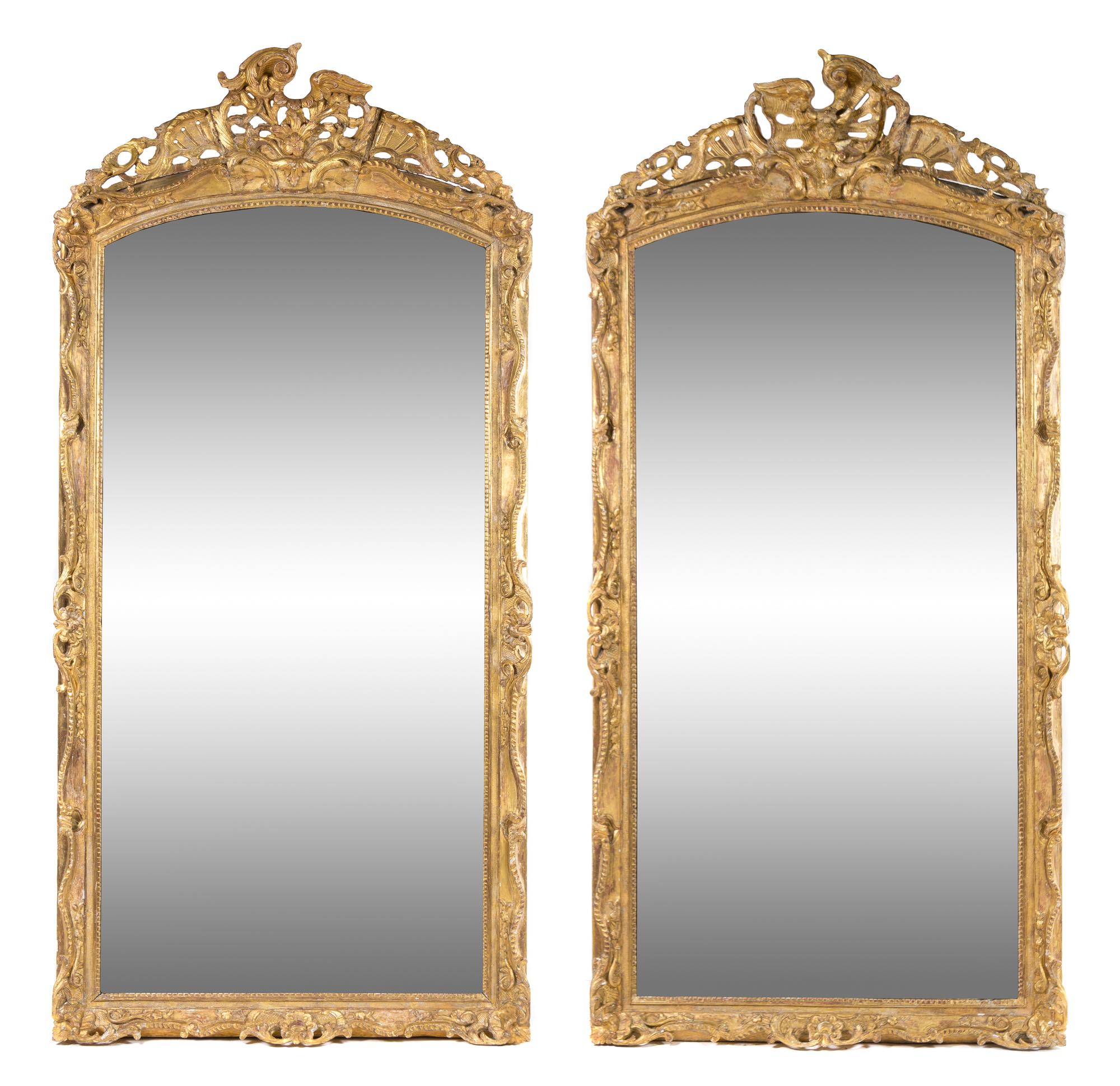 A Pair of Rococo Style Giltwood Pier Mirrors Height 92 x width 44 1/2 inches. — 19TH CENTURY