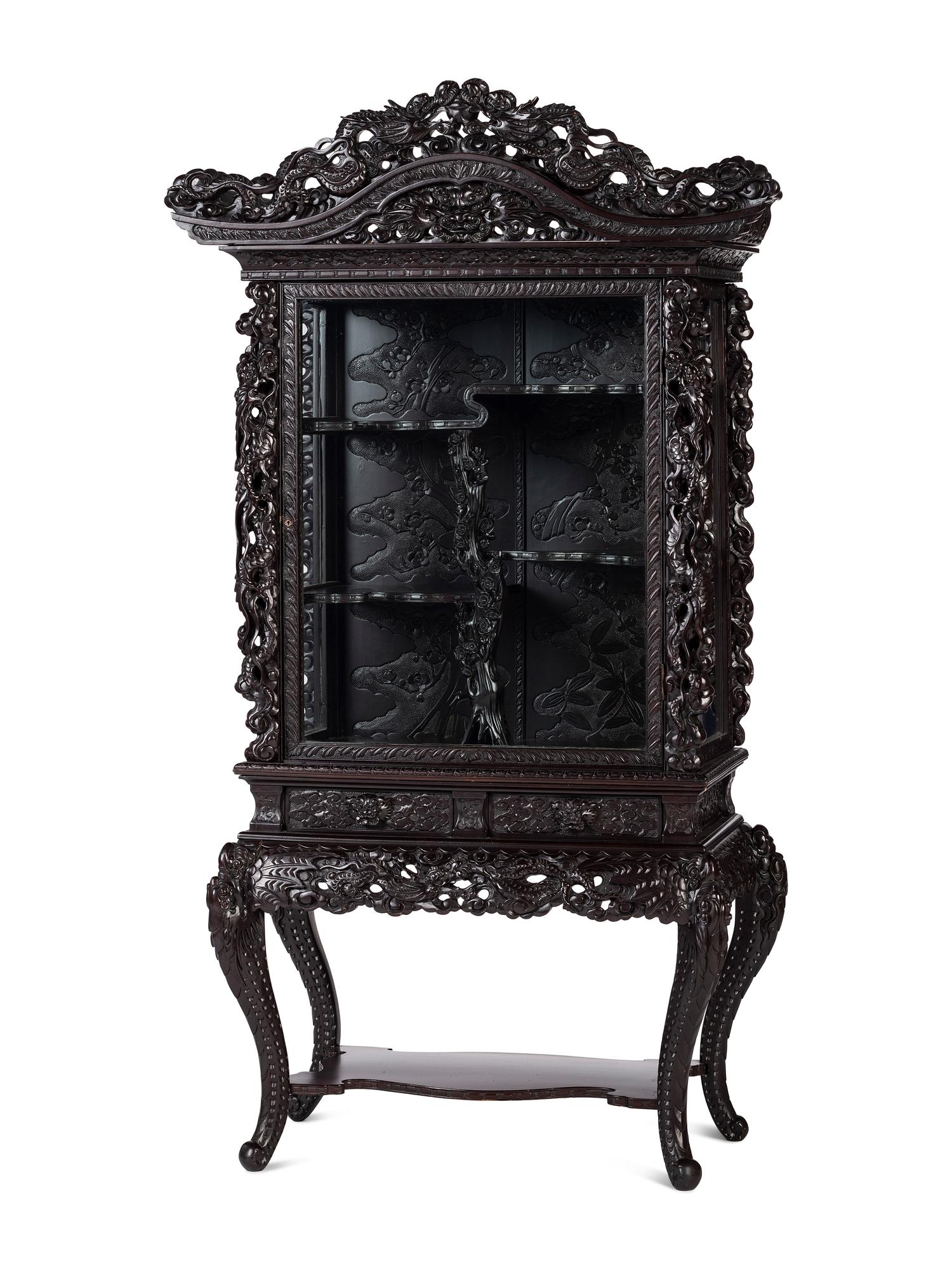 A Japanese Carved Hardwood Display Cabinet