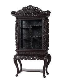 A Japanese Carved Hardwood Display Cabinet