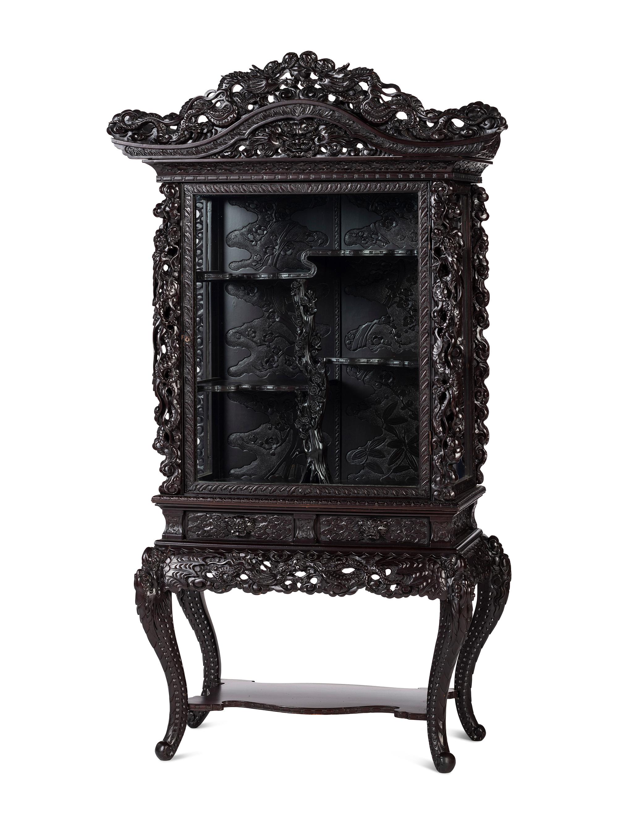 A Japanese Carved Hardwood Display Cabinet