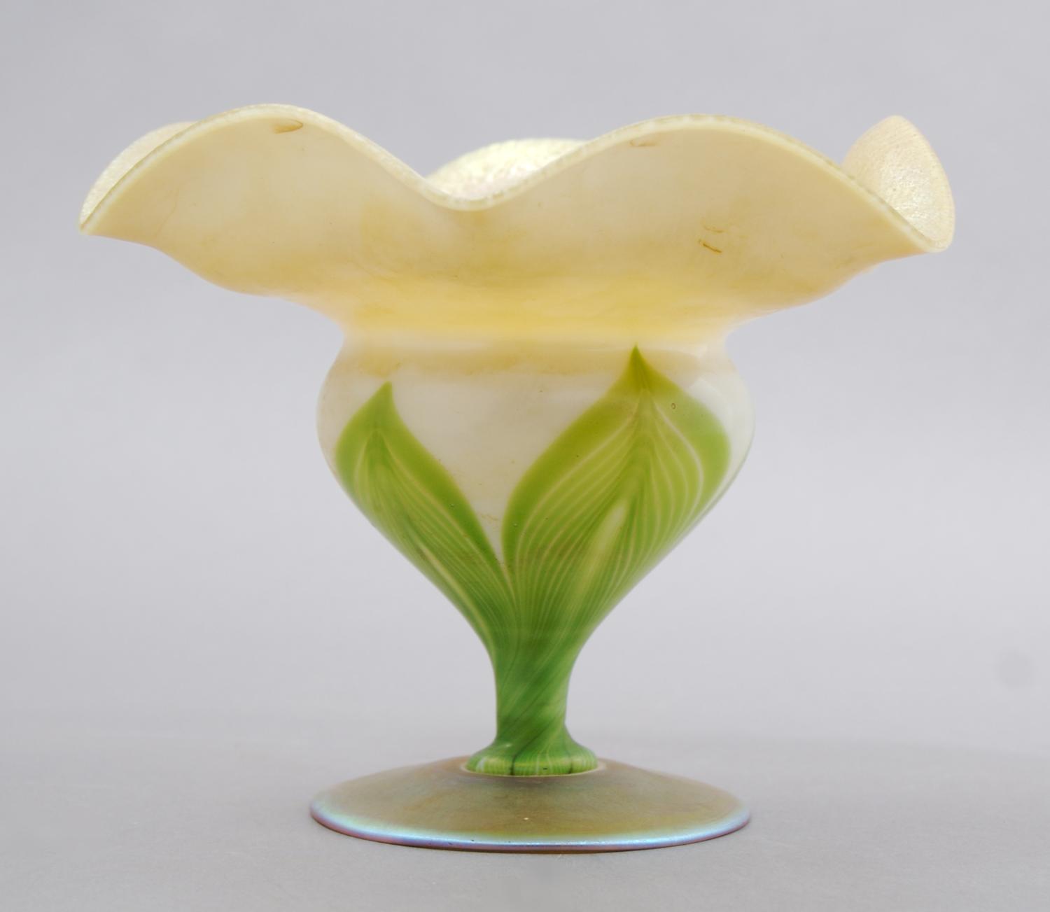 A Tiffany Favrile Glass Floriform Vase, Height 4 1/2 inches.