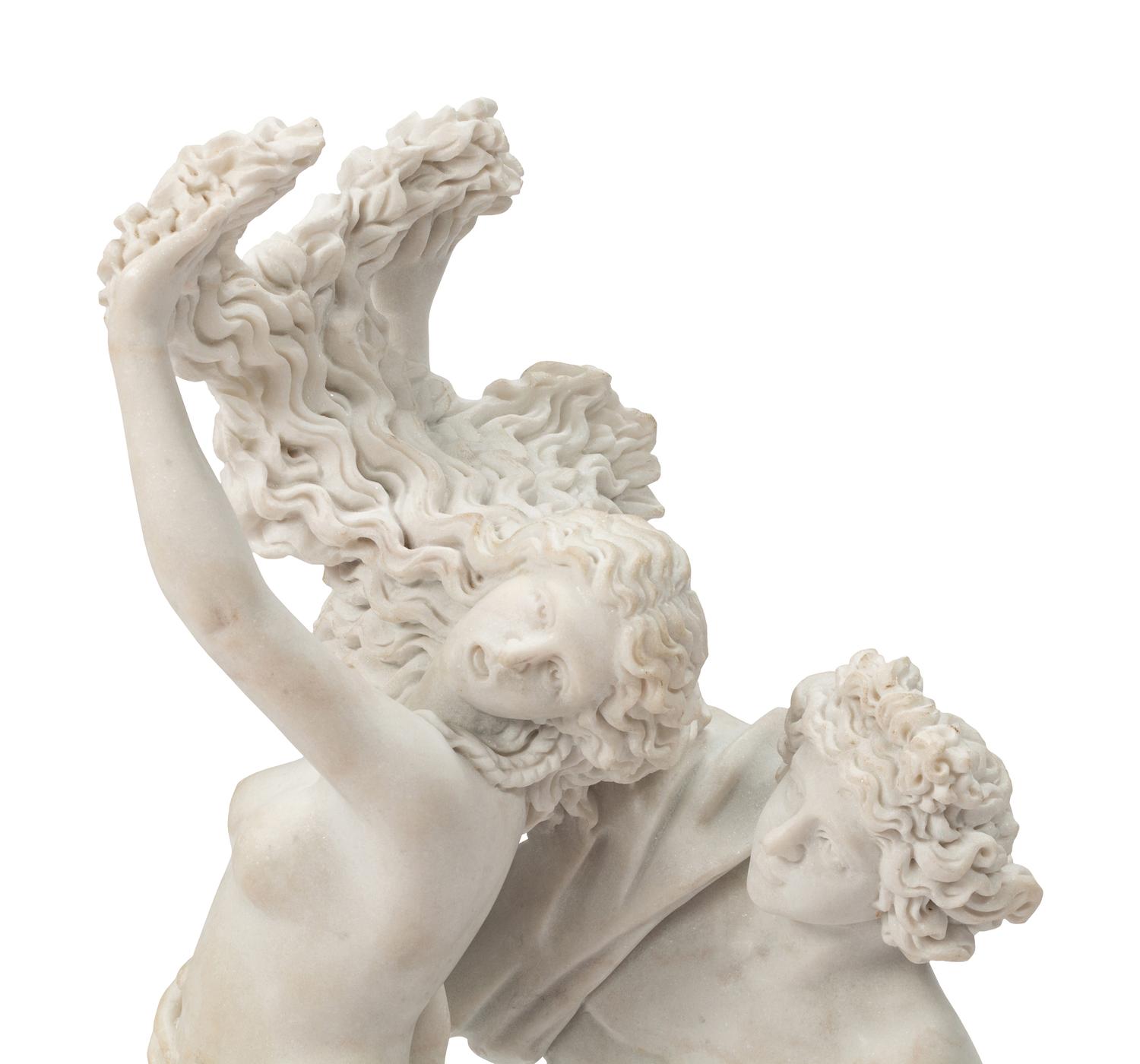 A Continental Marble Figural Group on a Wood Base