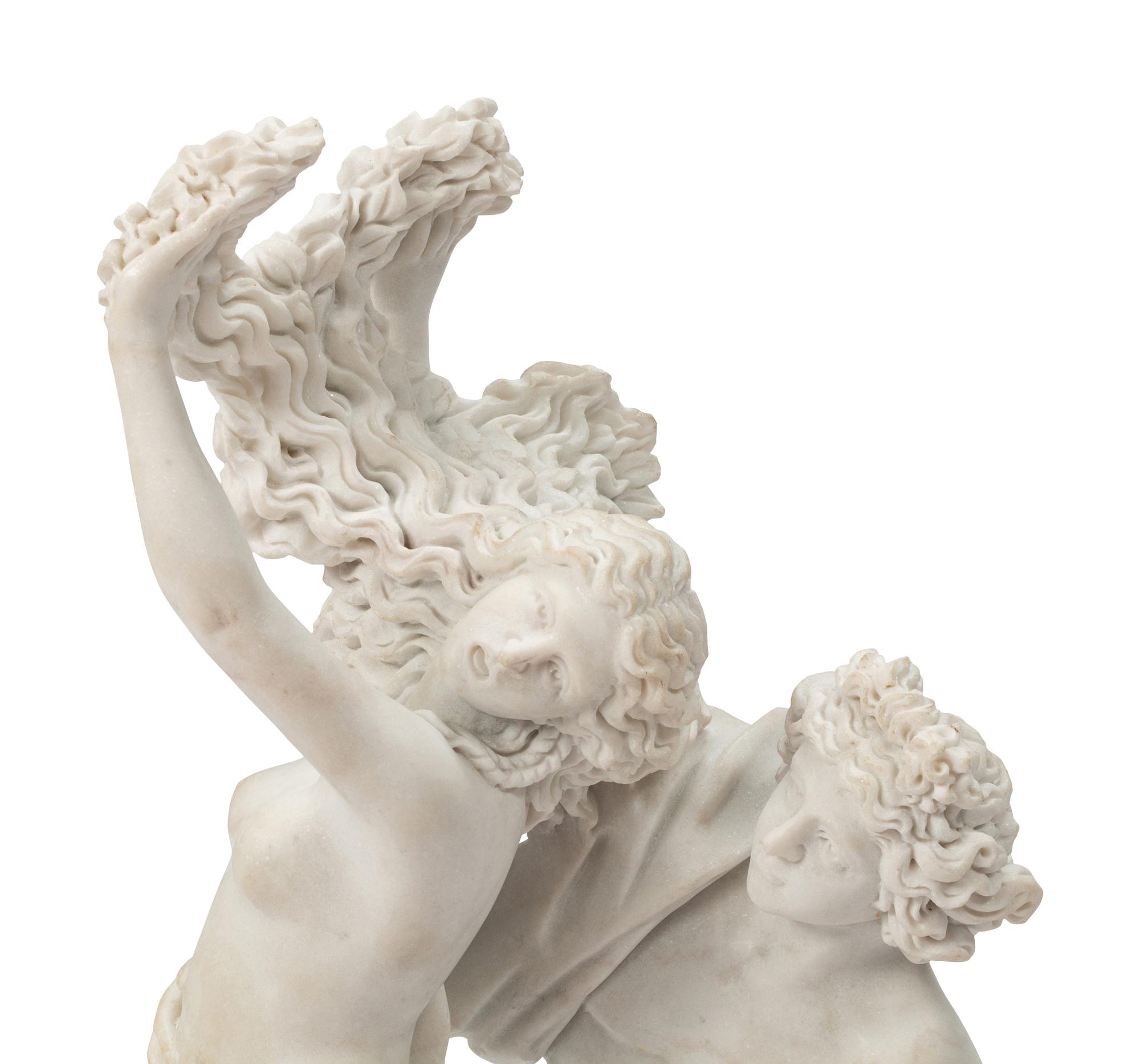A Continental Marble Figural Group on a Wood Base