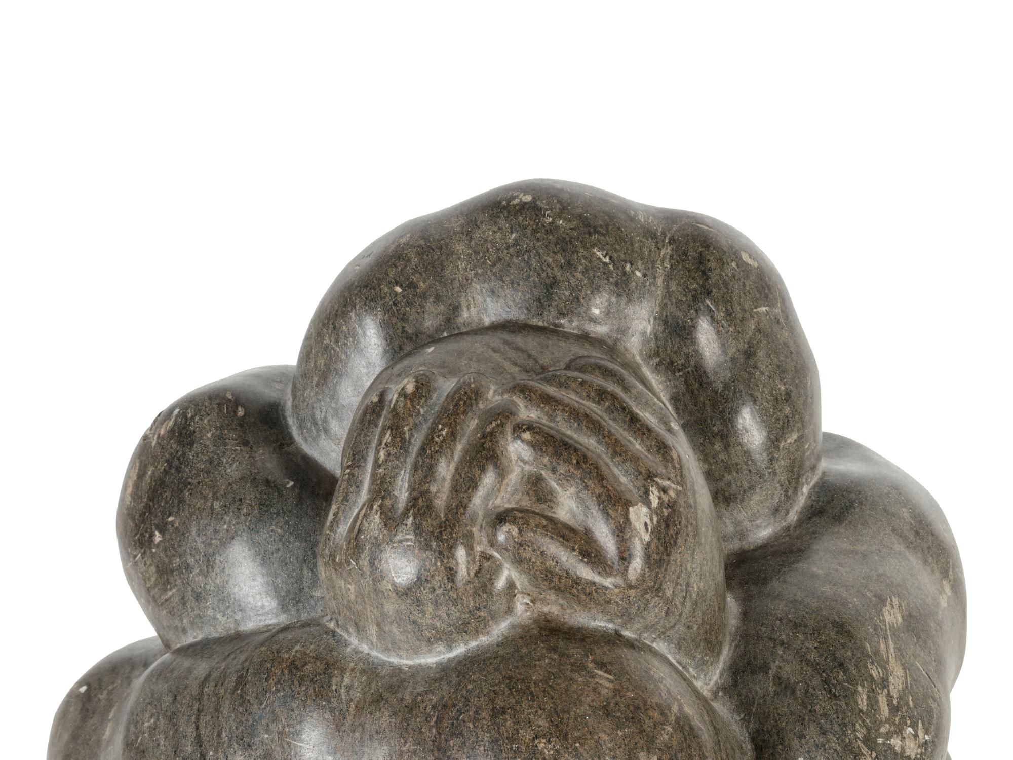 A Large Inuit Carved Stone Figural Group