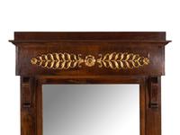 An Empire Walnut and Parcel Gilt Mirror