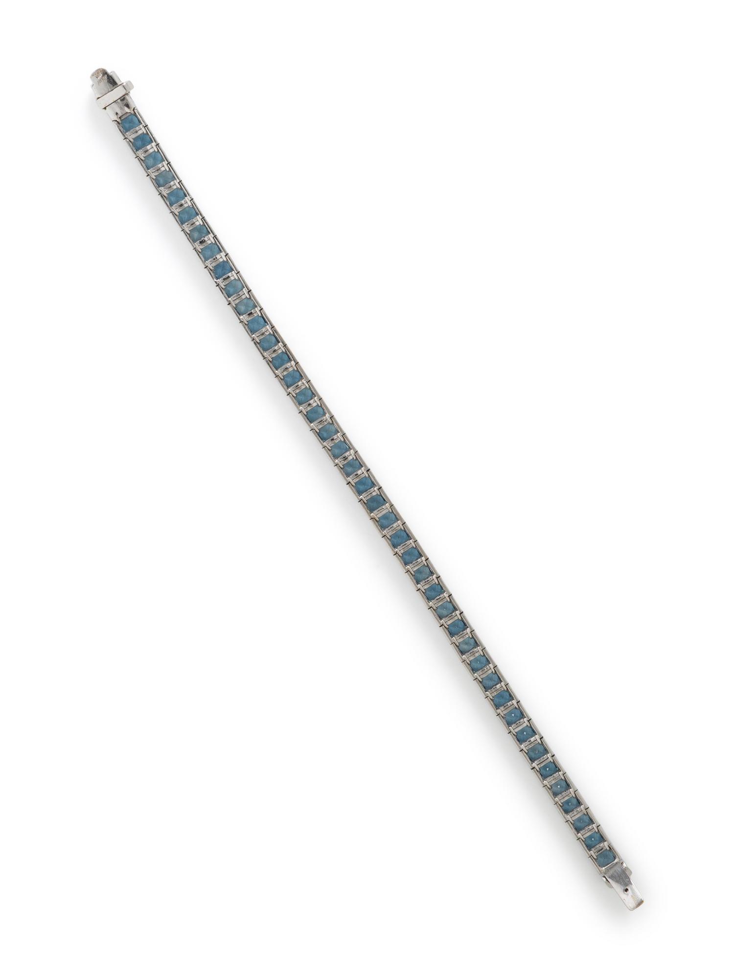 WHITE GOLD AND PRINCESS CUT AQUAMARINE LINE BRACELET