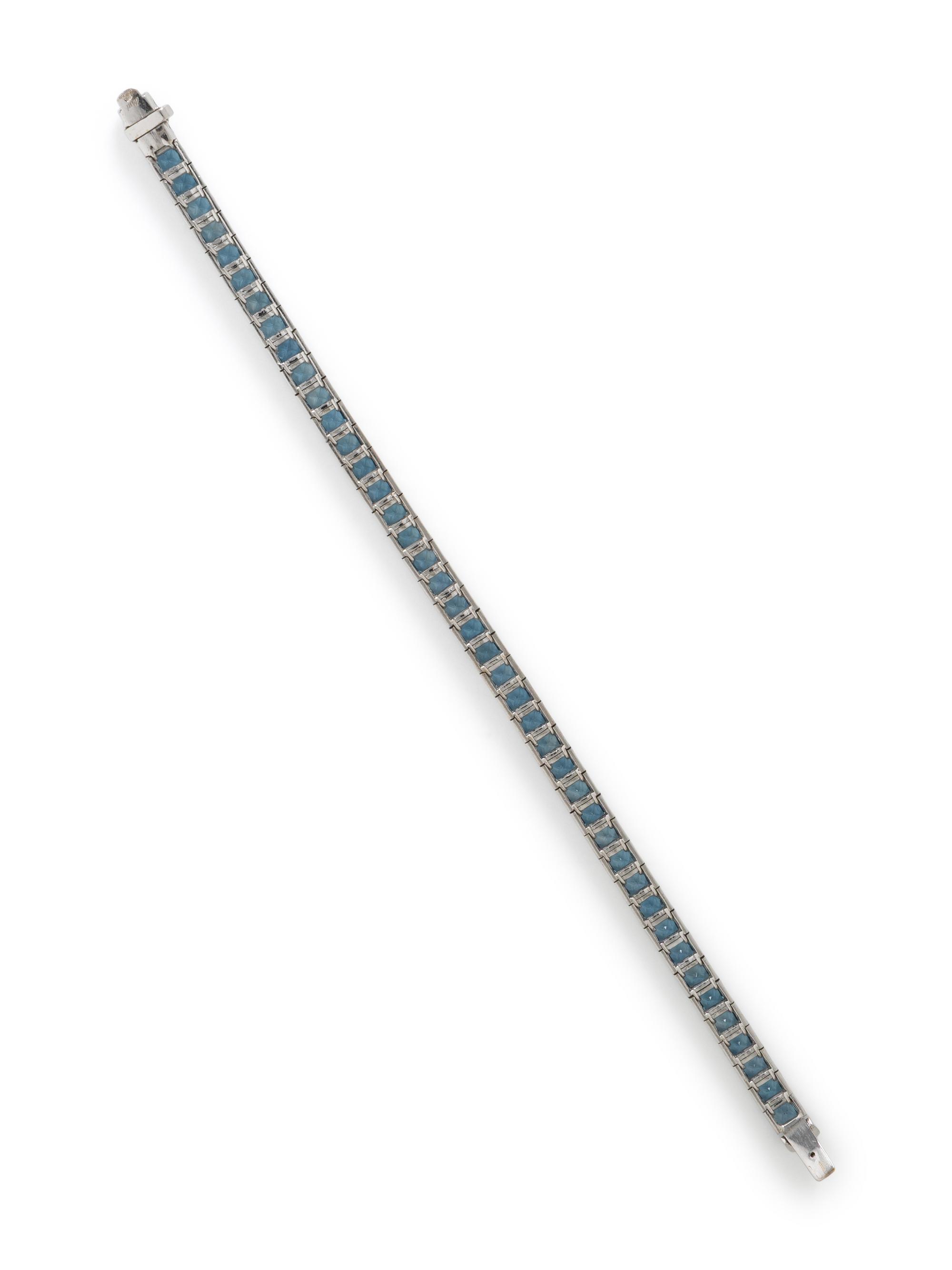 WHITE GOLD AND PRINCESS CUT AQUAMARINE LINE BRACELET