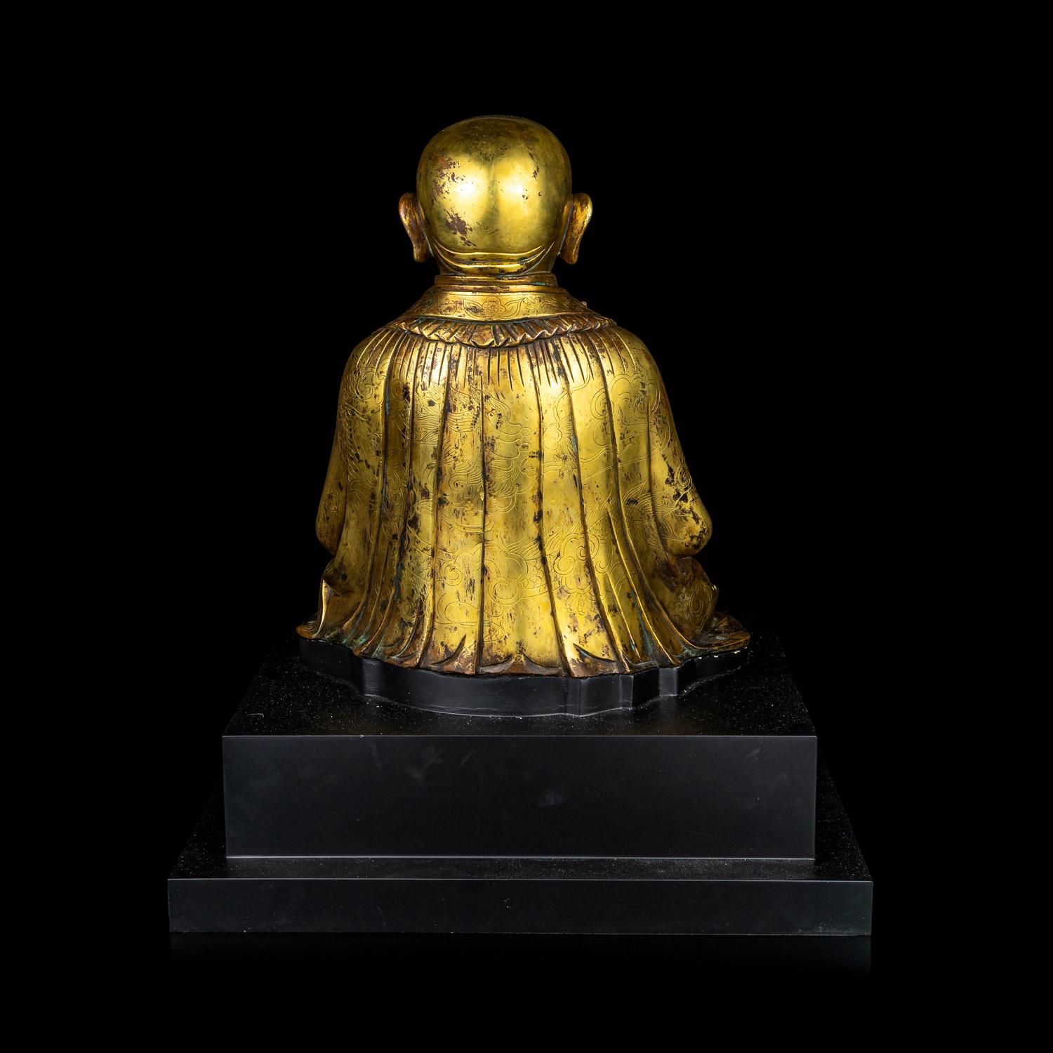 A Large Sino-Tibetan Gilt Bronze Figure of a Lama 巨型銅鎏金上師坐像