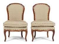 A Pair of French Provincial Style Carved Fruitwood Boudoir Chairs Height 30 3/4 inches. — 19TH CENTURY