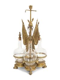 A Regency Gilt Bronze Tantalus Stand