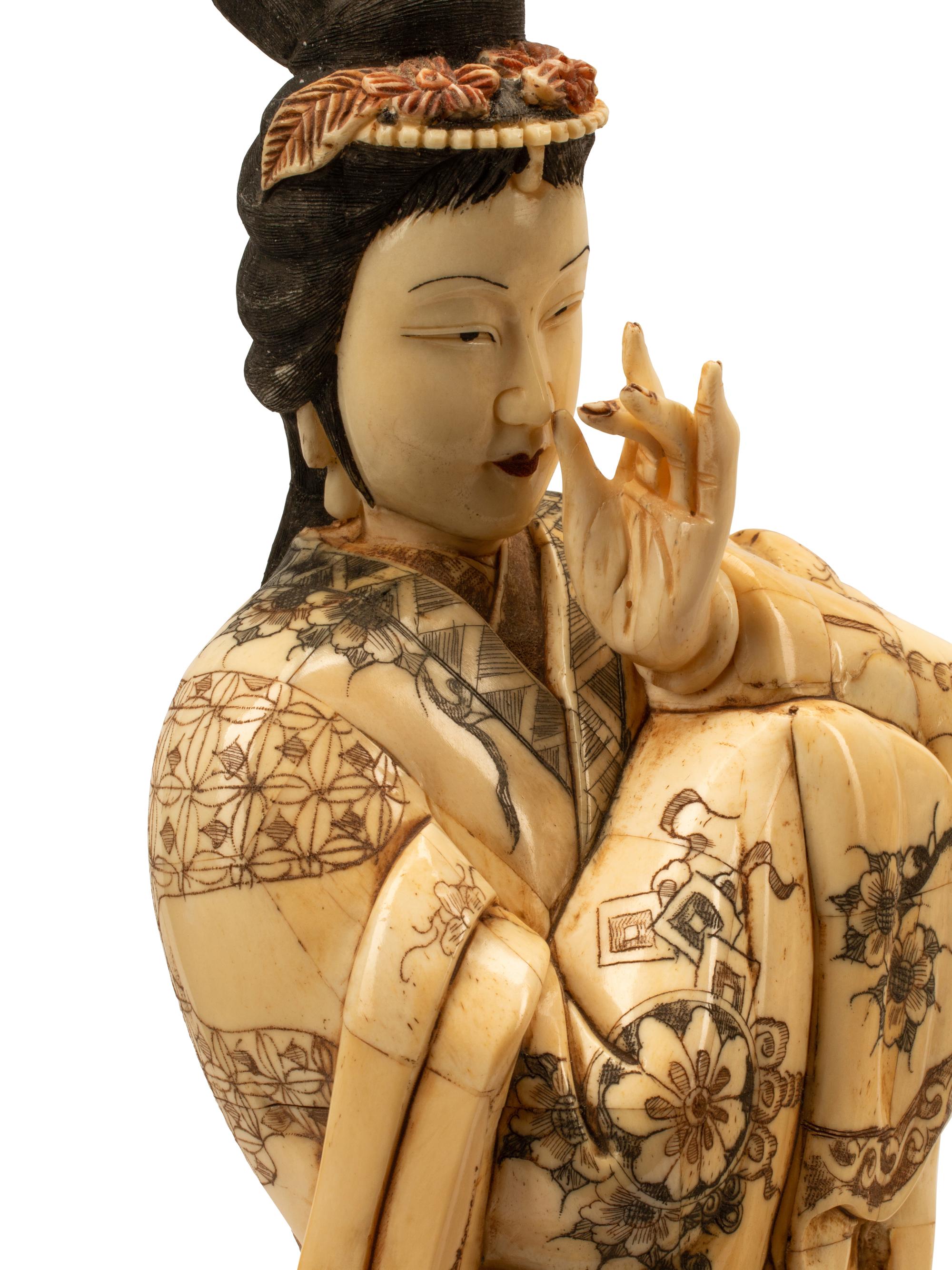 A Set of Four Japanese Bone and Enamel Figures of Ladies