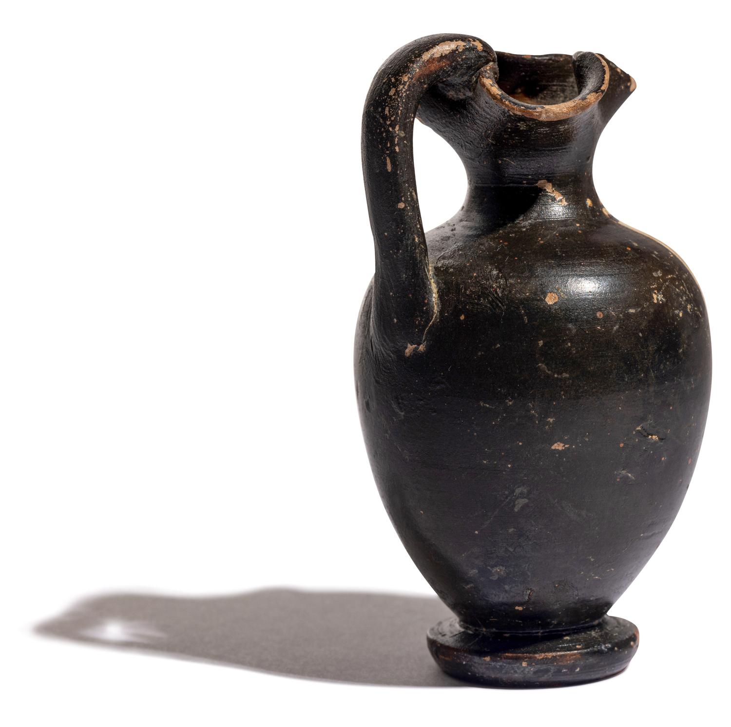 A Greek Black-Figured Trefoil Oinochoe