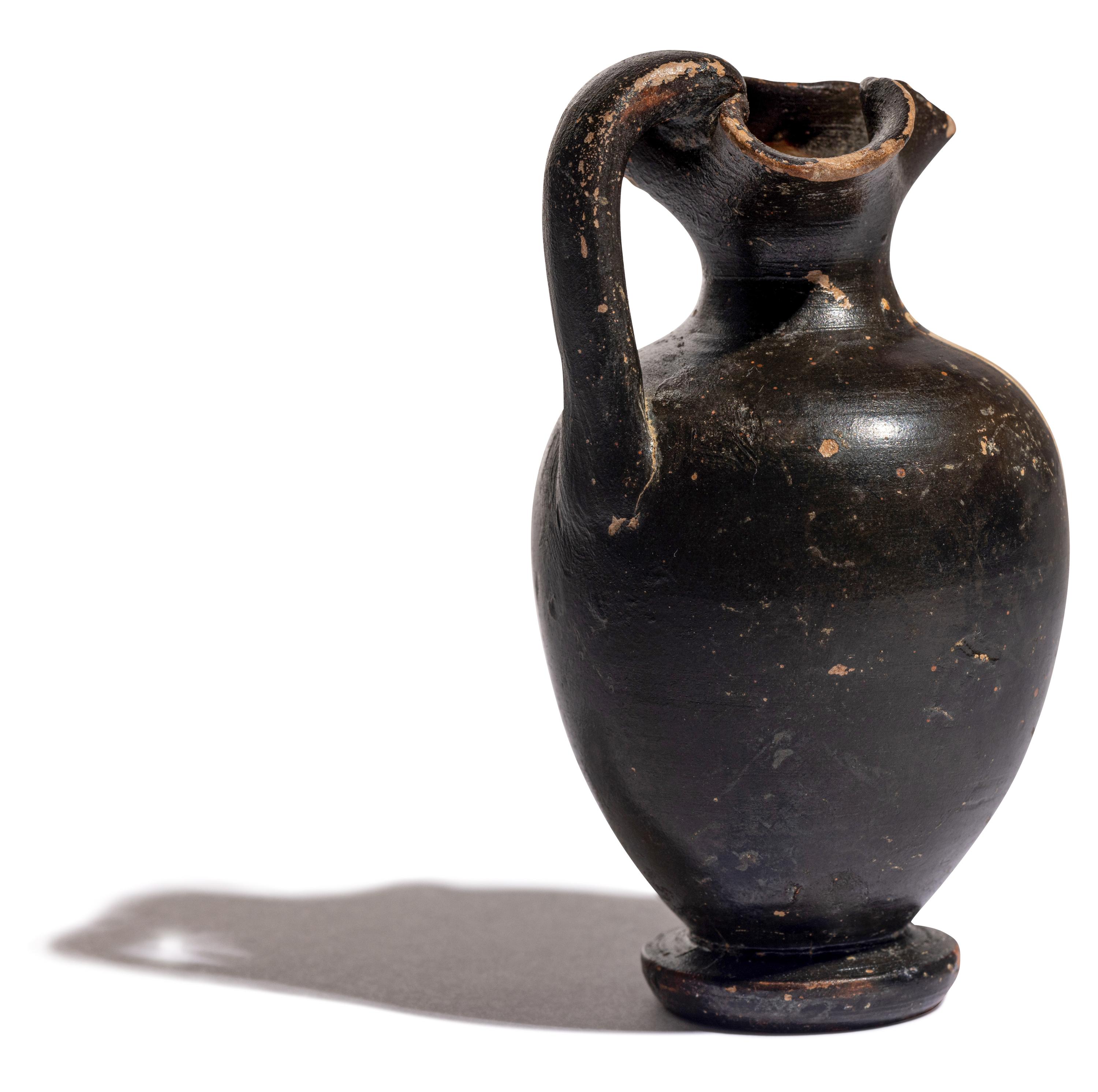 A Greek Black-Figured Trefoil Oinochoe
