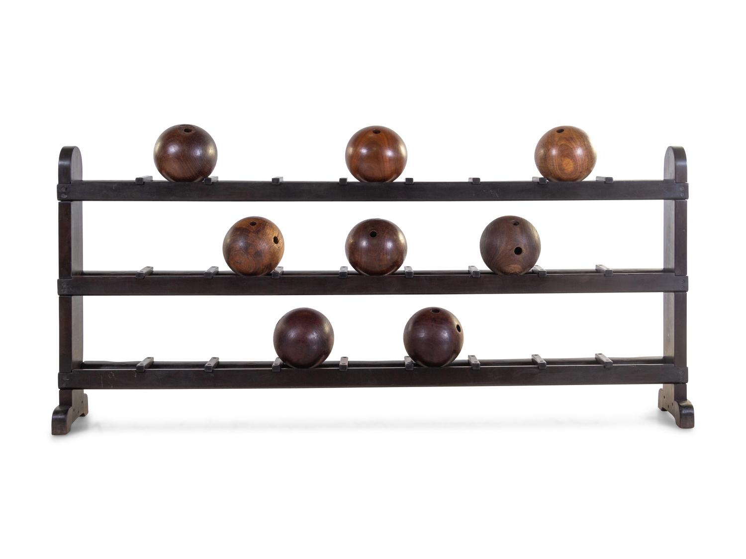 An American Painted Wood Bowling Ball Rack and Balls