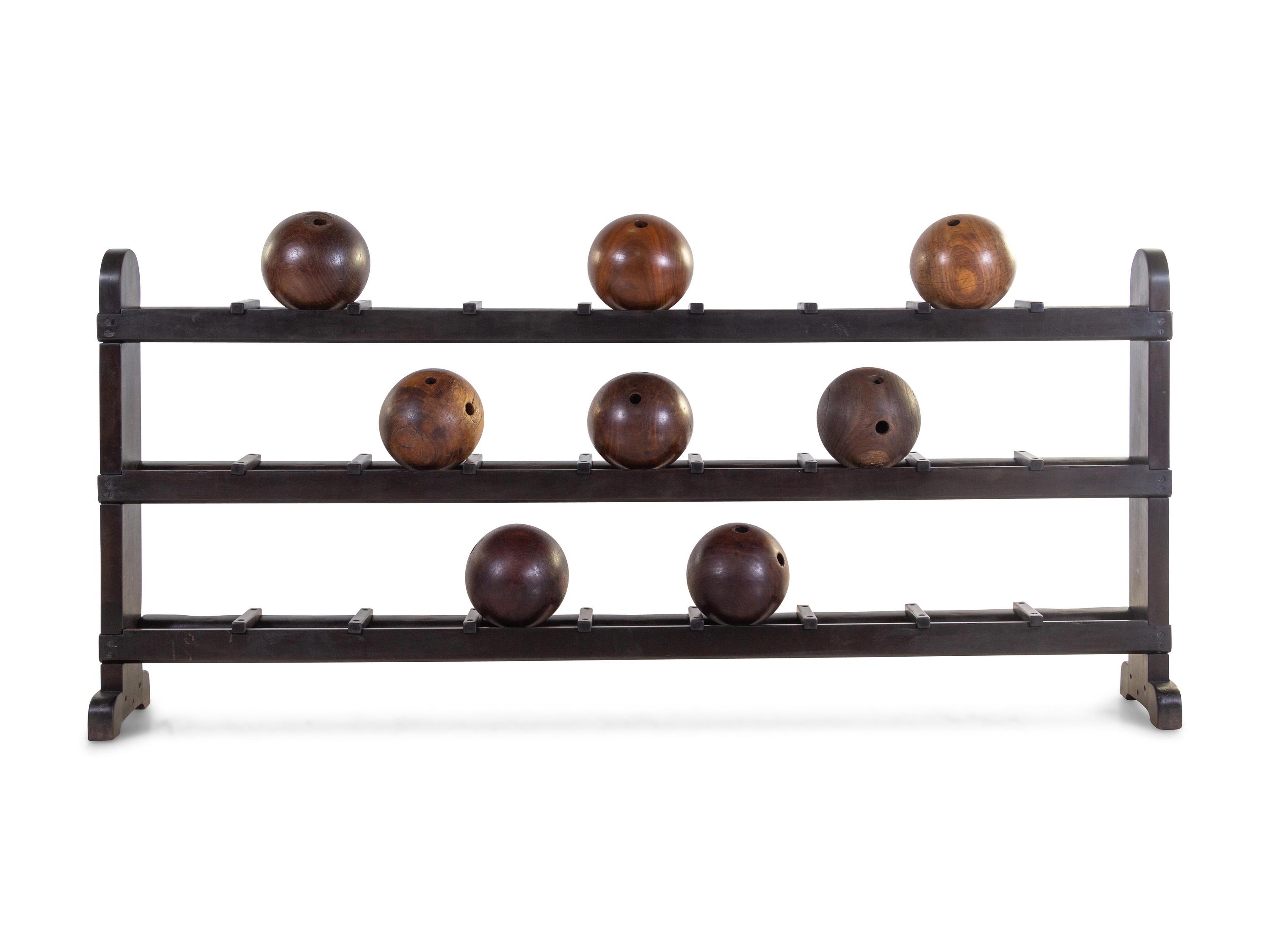 An American Painted Wood Bowling Ball Rack and Balls