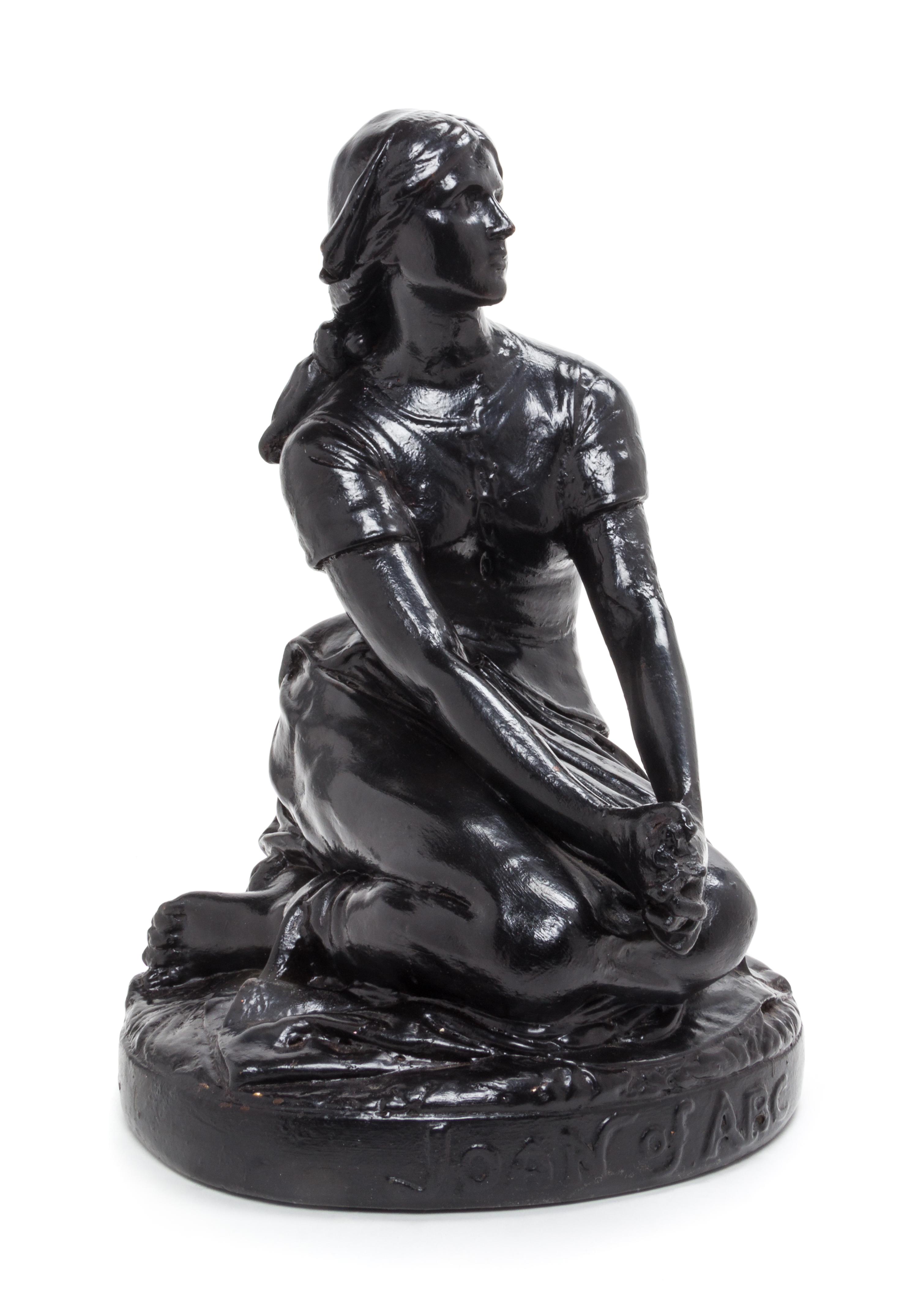 A Continental Plaster Figure of Joan of Arc Height 18 inches.