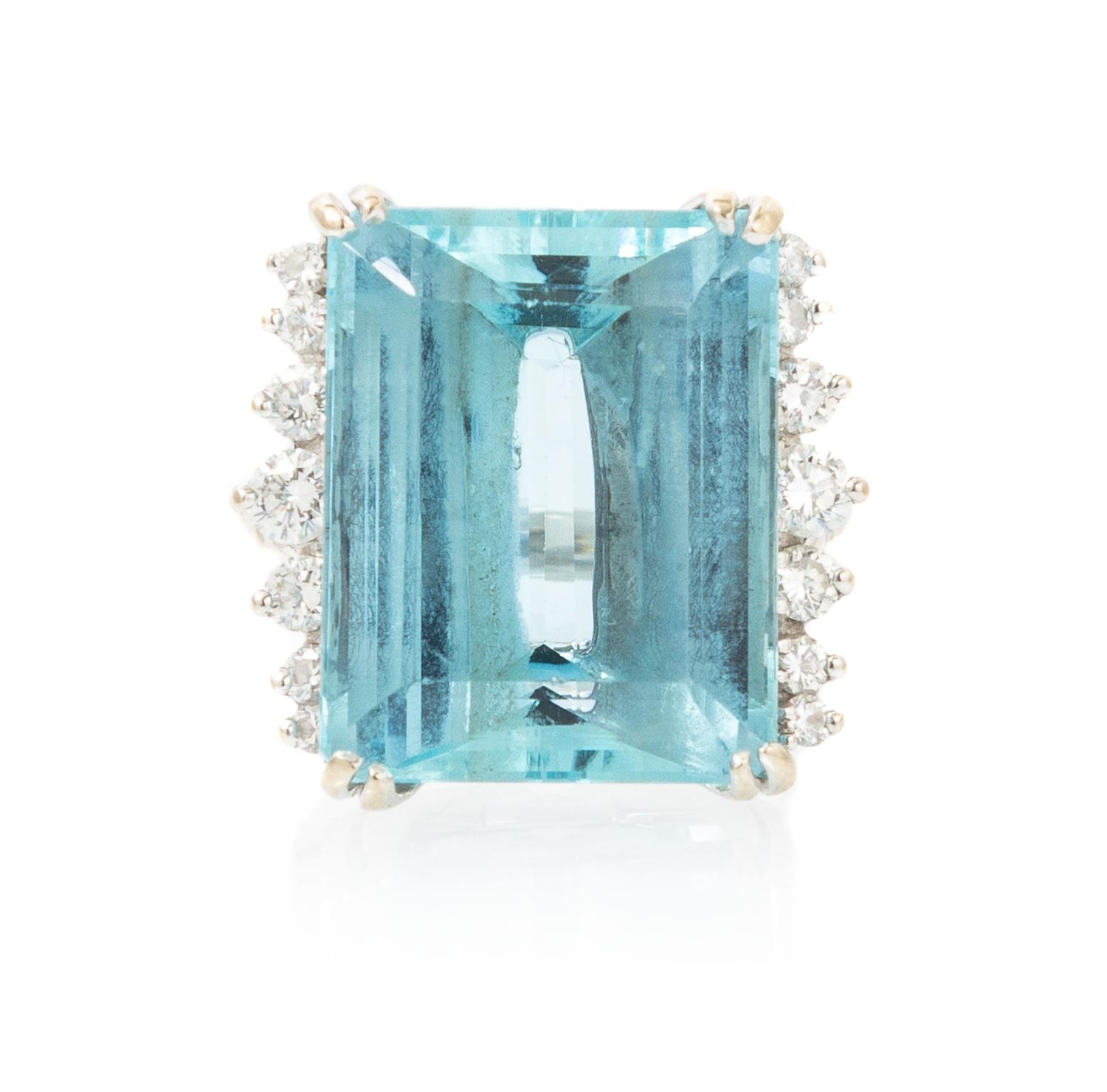 A 14 Karat White Gold, Aquamarine and Diamond Ring, 6.90 dwts.