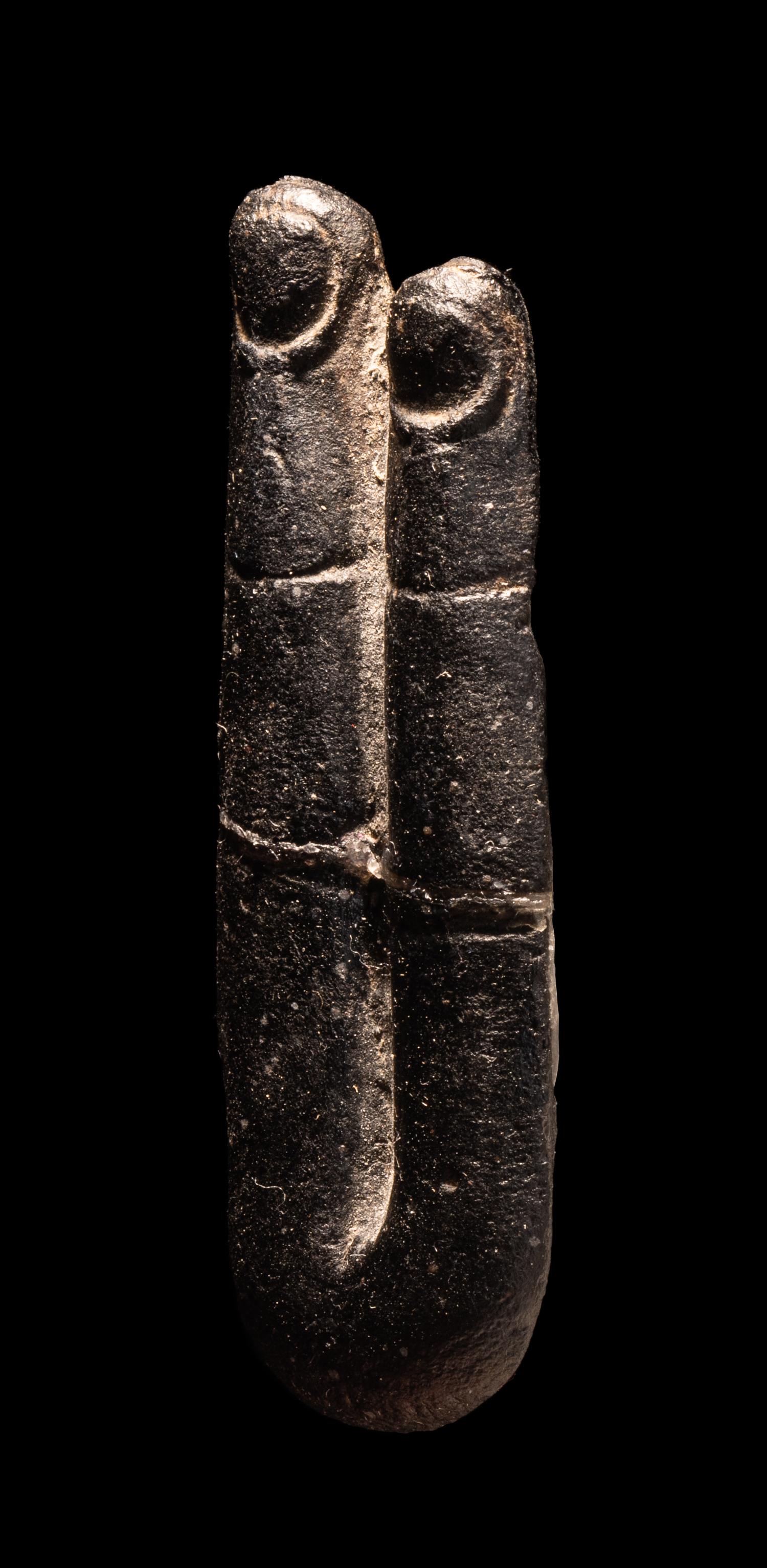 An Egyptian Stone Two-Finger Amulet