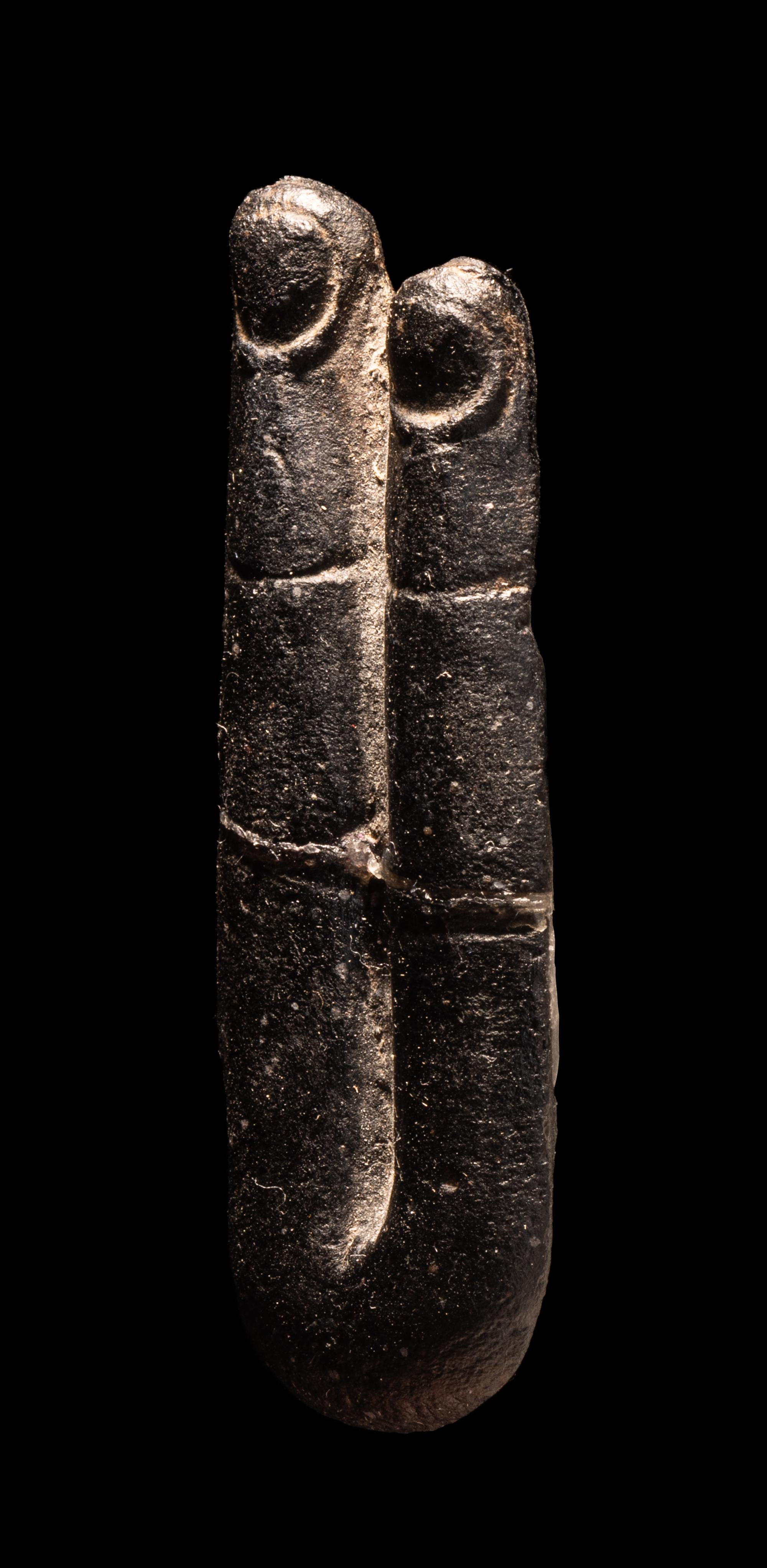 An Egyptian Stone Two-Finger Amulet