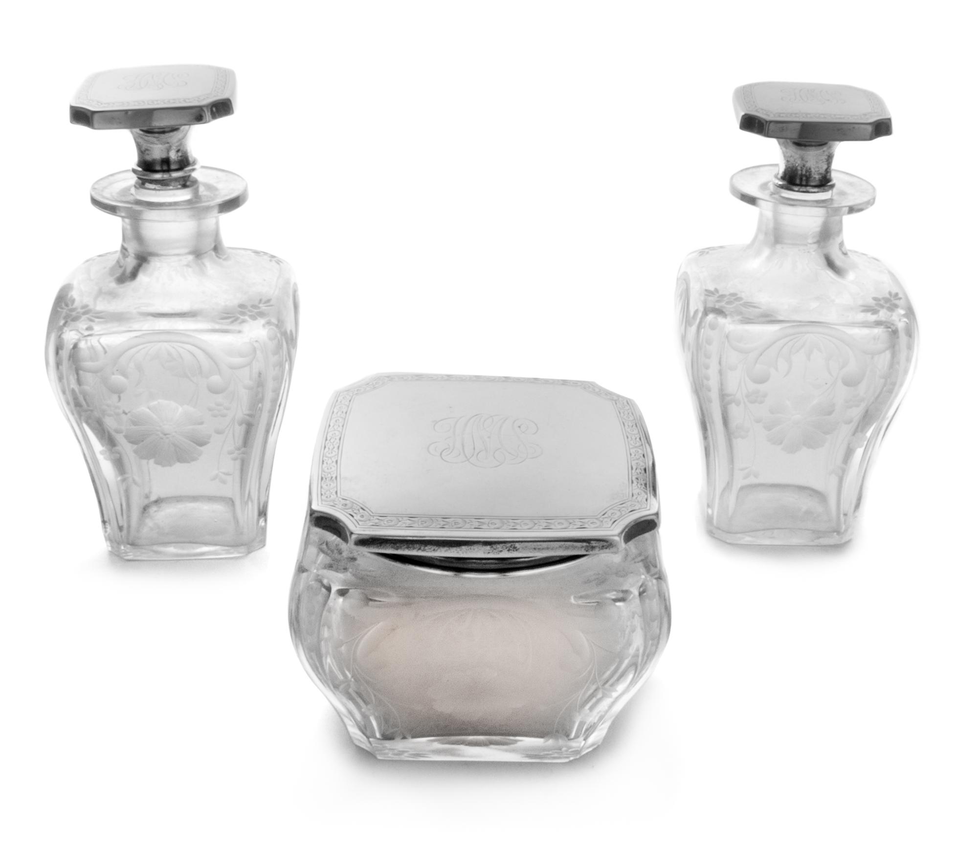 A Group of American Silver Mounted Dresser Articles, Gorham Mfg. Co., Providence, RI, comprising three silver mounted glass bottles and