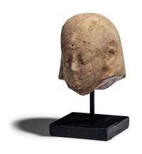 An Egyptian Faience Ushabti Head