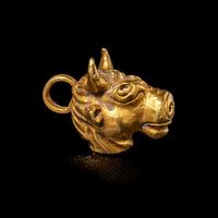 A Roman Gold Bull Pendant