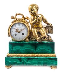 A French Gilt Bronze and Malachite Mounted Figural Mantel Clock Height 14 inches. — RETAILED BY THEODORE B. STARR, LATE 19TH CENTURY