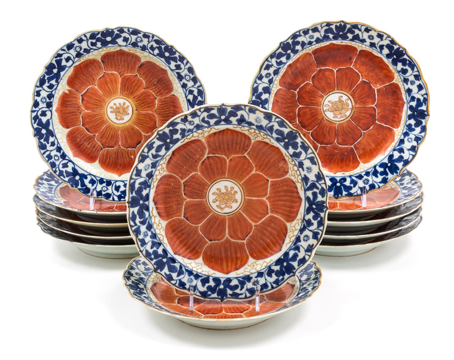 A Set of Twelve Chinese Blue, White and Iron Red Porcelain Dishes Diameter 8 inches.