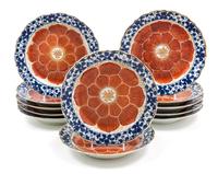 A Set of Twelve Chinese Blue, White and Iron Red Porcelain Dishes Diameter 8 inches.