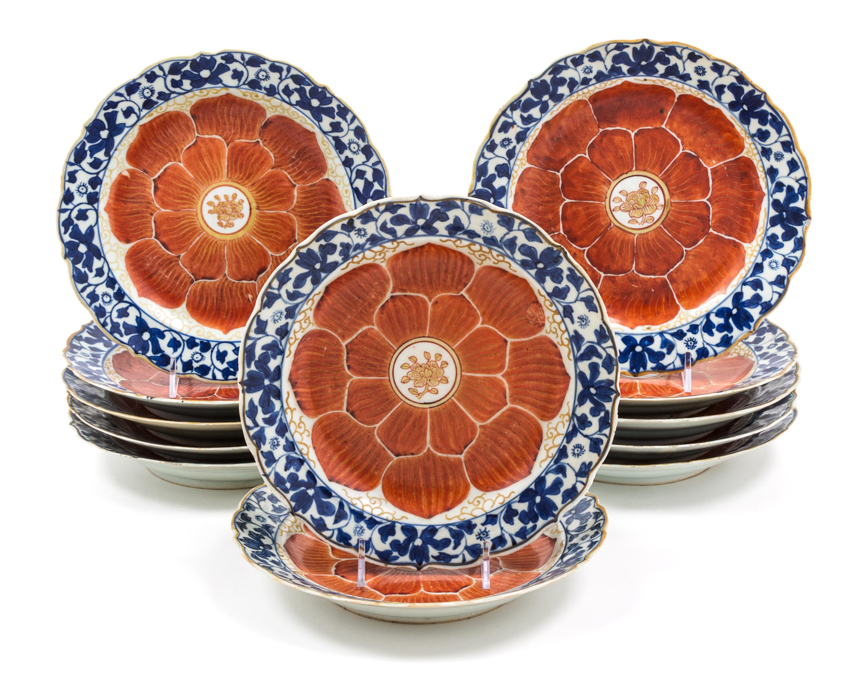 A Set of Twelve Chinese Blue, White and Iron Red Porcelain Dishes Diameter 8 inches.