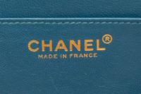A Chanel Blue Calfskin Leather Accordian Flap Handbag, 9" x 5" x 4".