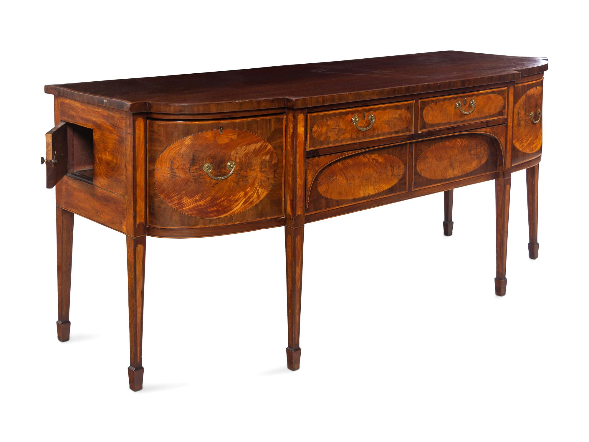 A George III Satinwood and Mahogany Breakfront Sideboard