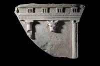 A Greco-Roman Limestone Fragment with Entablature and Bucranium