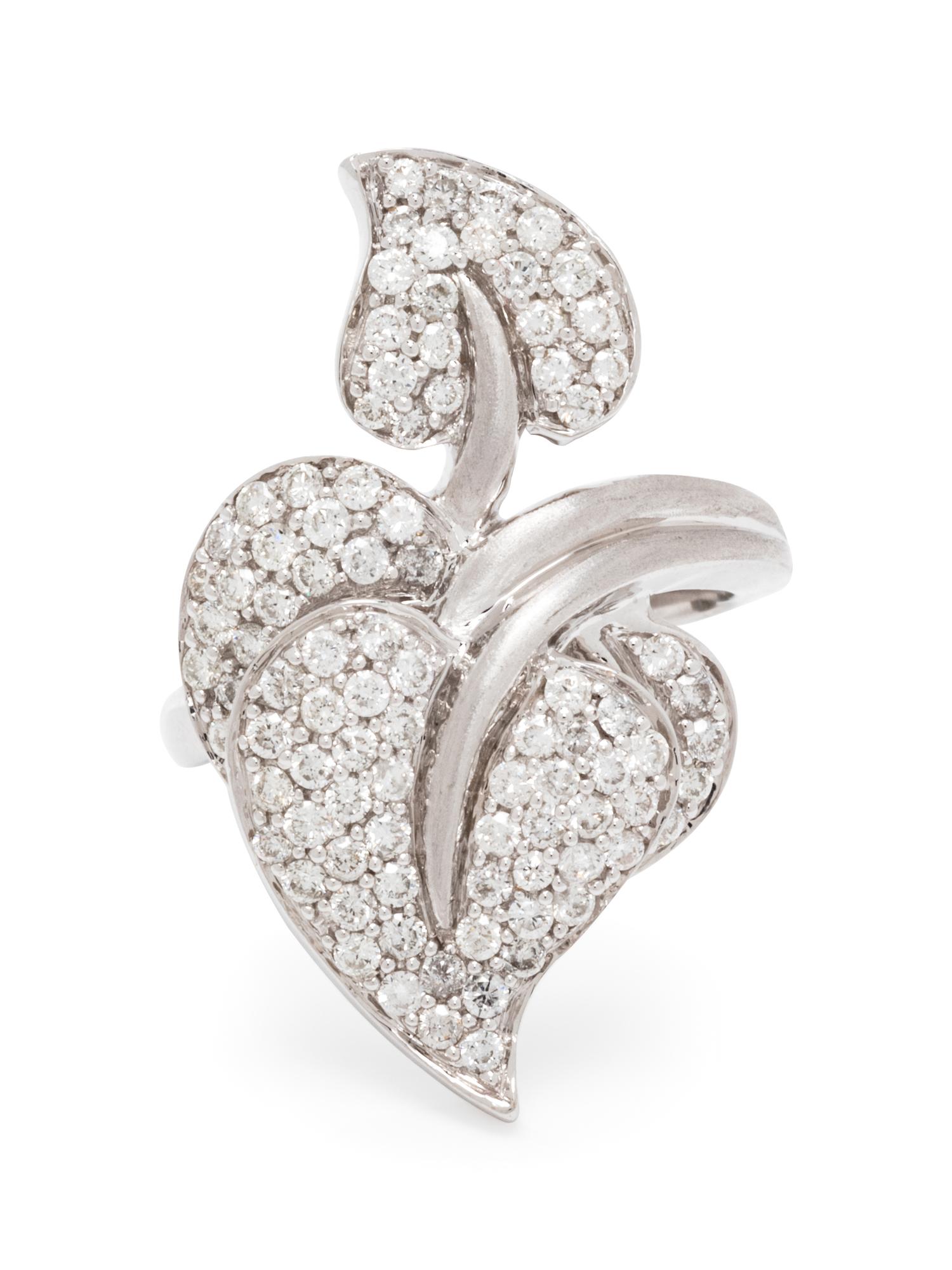 A 14 Karat White Gold and Diamond Leaf Motif Ring,
