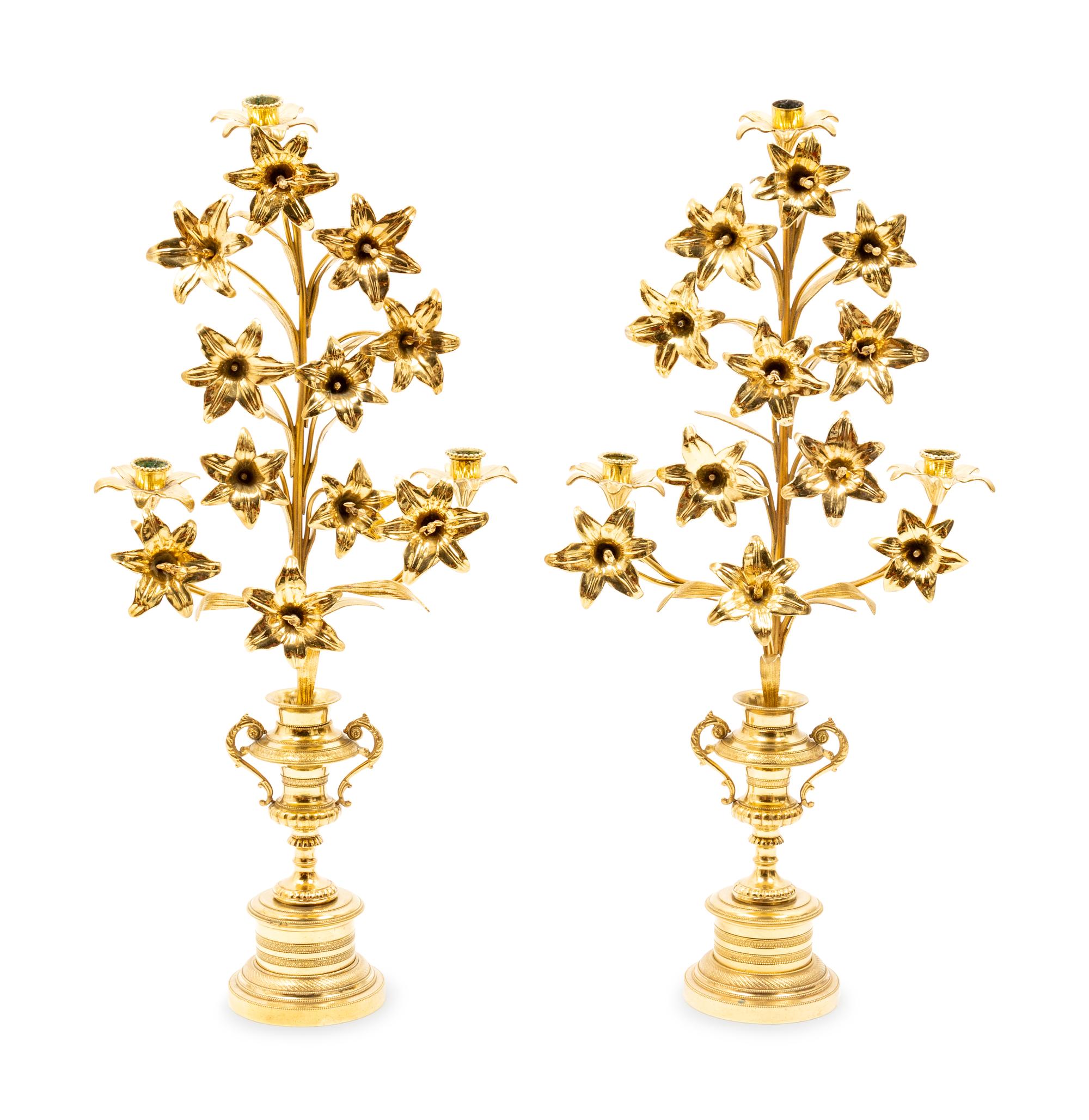 A Pair of Gilt Metal Three Light Candelabras