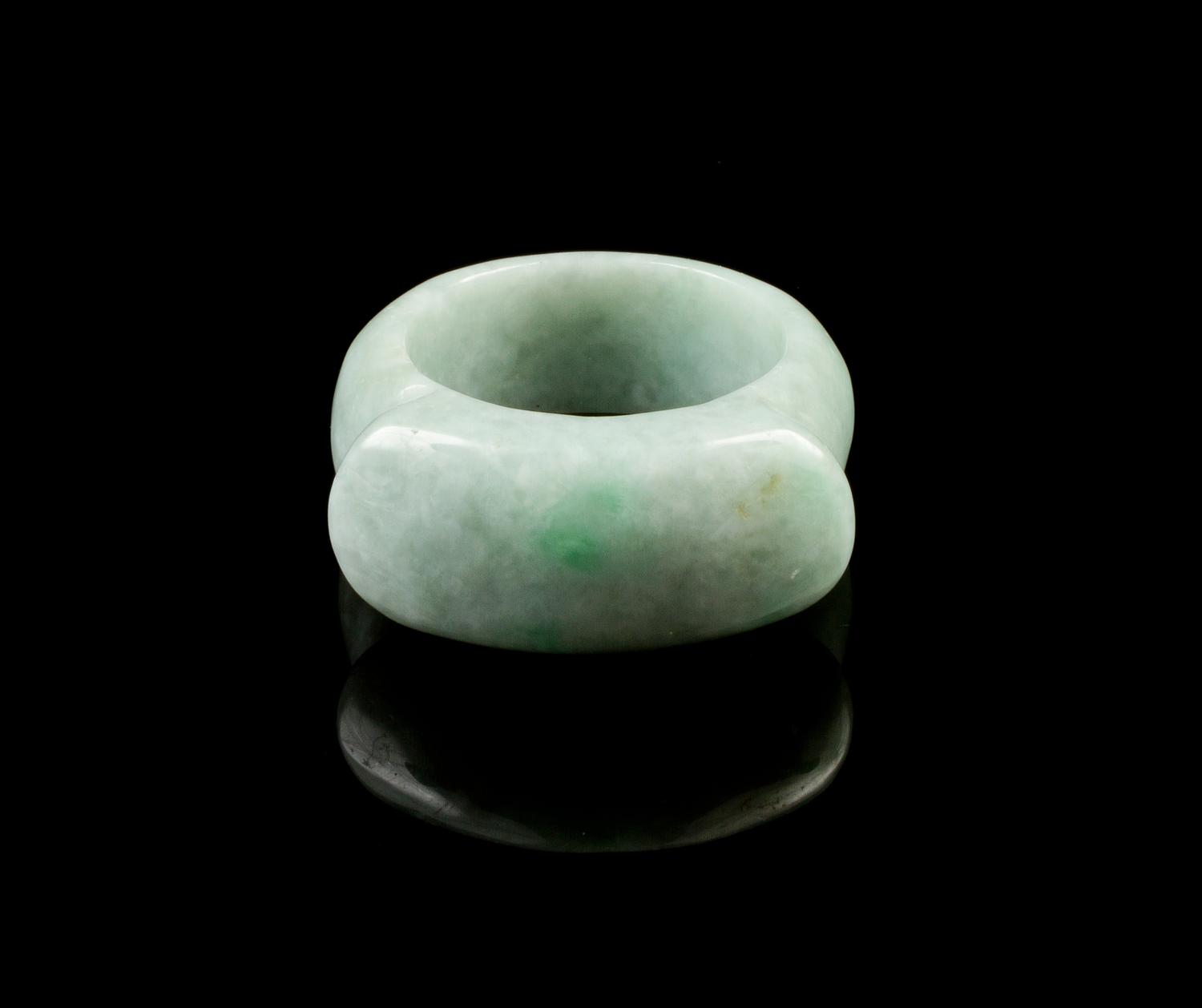 A Jadeite Archer's Ring Diameter of interior 13/16 inch.