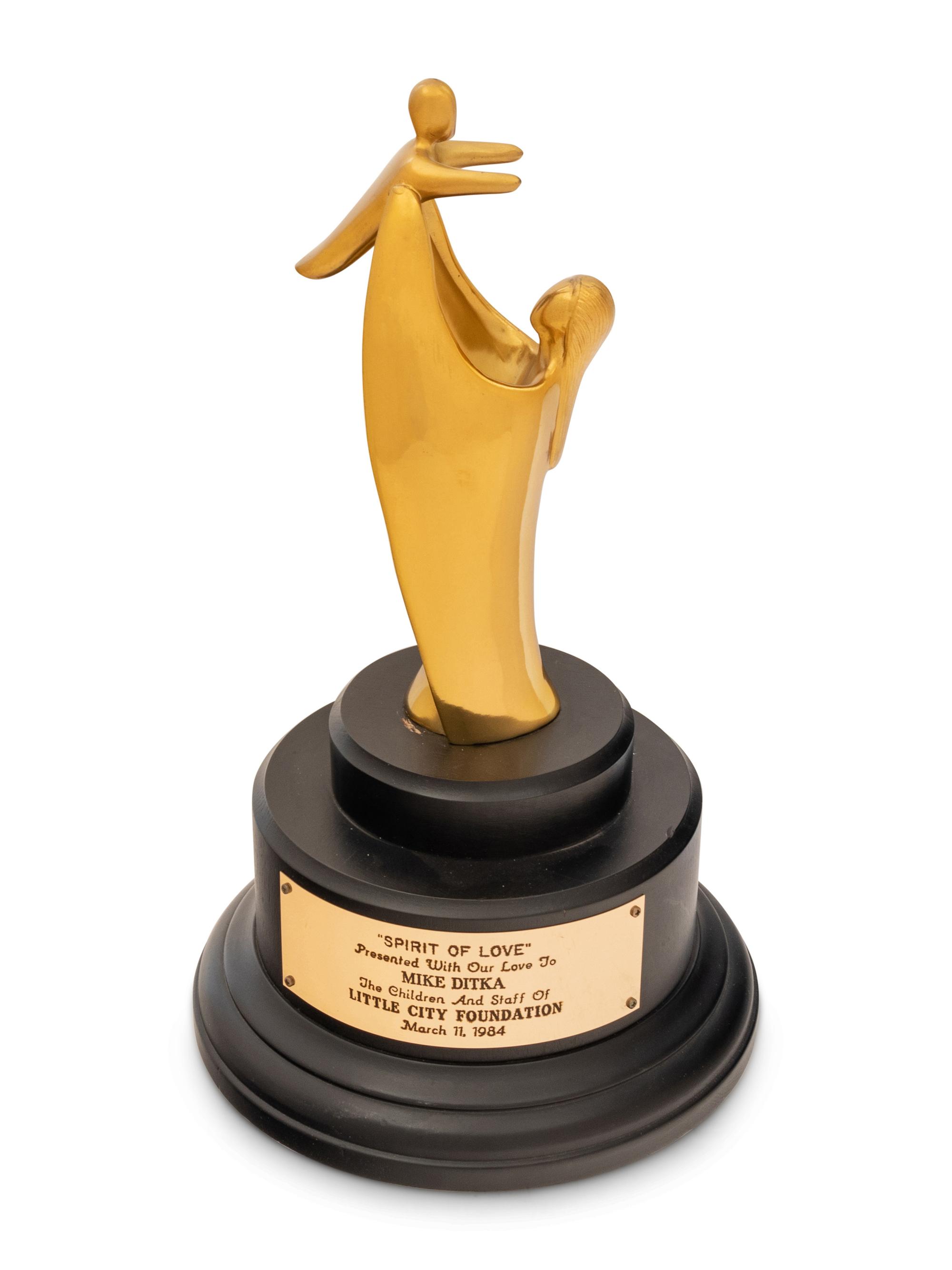 A 1984 Spirit of Love Trophy Awarded to Mike Ditka by Little City Foundation Formerly Displayed at Mike Ditka's Restaurant